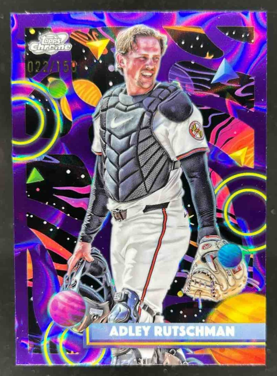 Card image for Adley Rutschman 2025 Topps Cosmic Chrome Purple Nebula Refractor /150