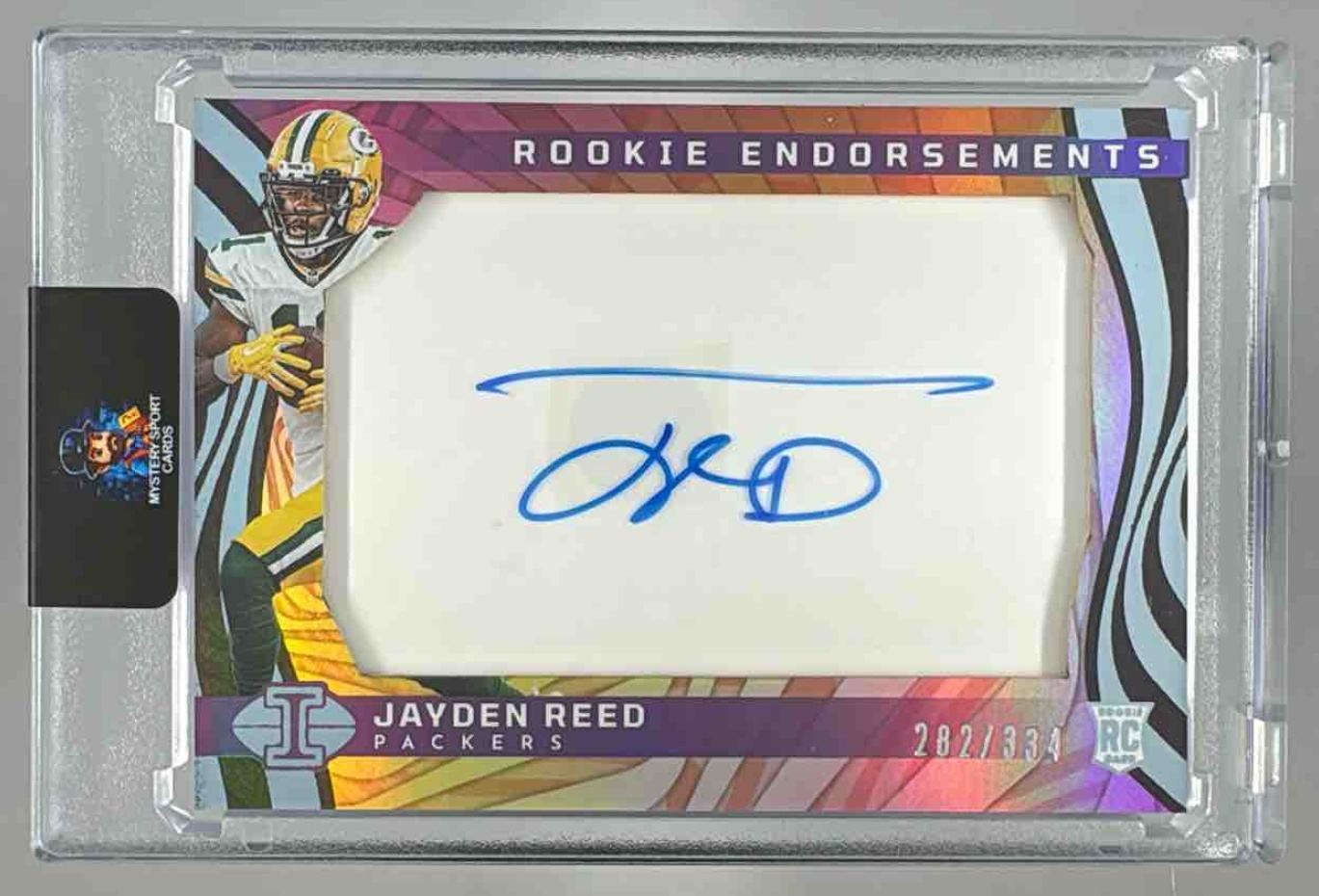 Card image for 2023 Panini Illusions Jayden Reed Rookie Endorsements /334 #RE-JRD Auto RC Packers