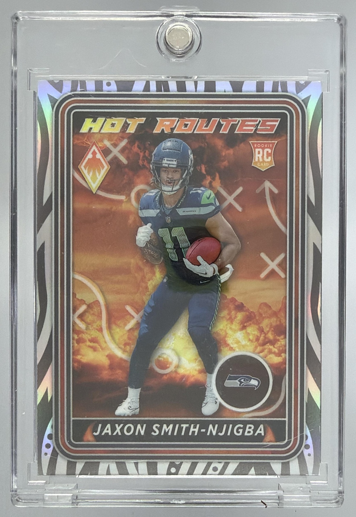 Card image for 2023 Panini Phoenix Jaxon Smith-Njigba Hot Routes #HR-2 RC Seahawks
