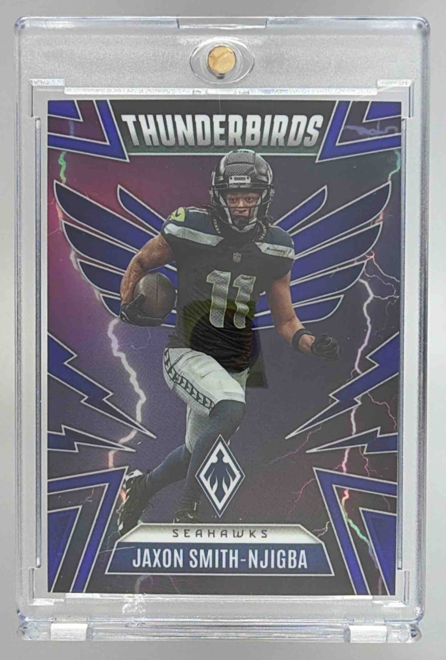 Card image for 2025 Panini Phoenix Jaxon Smith-Njigba Thunderbirds Blue Prizm /199 #46 Seahawks