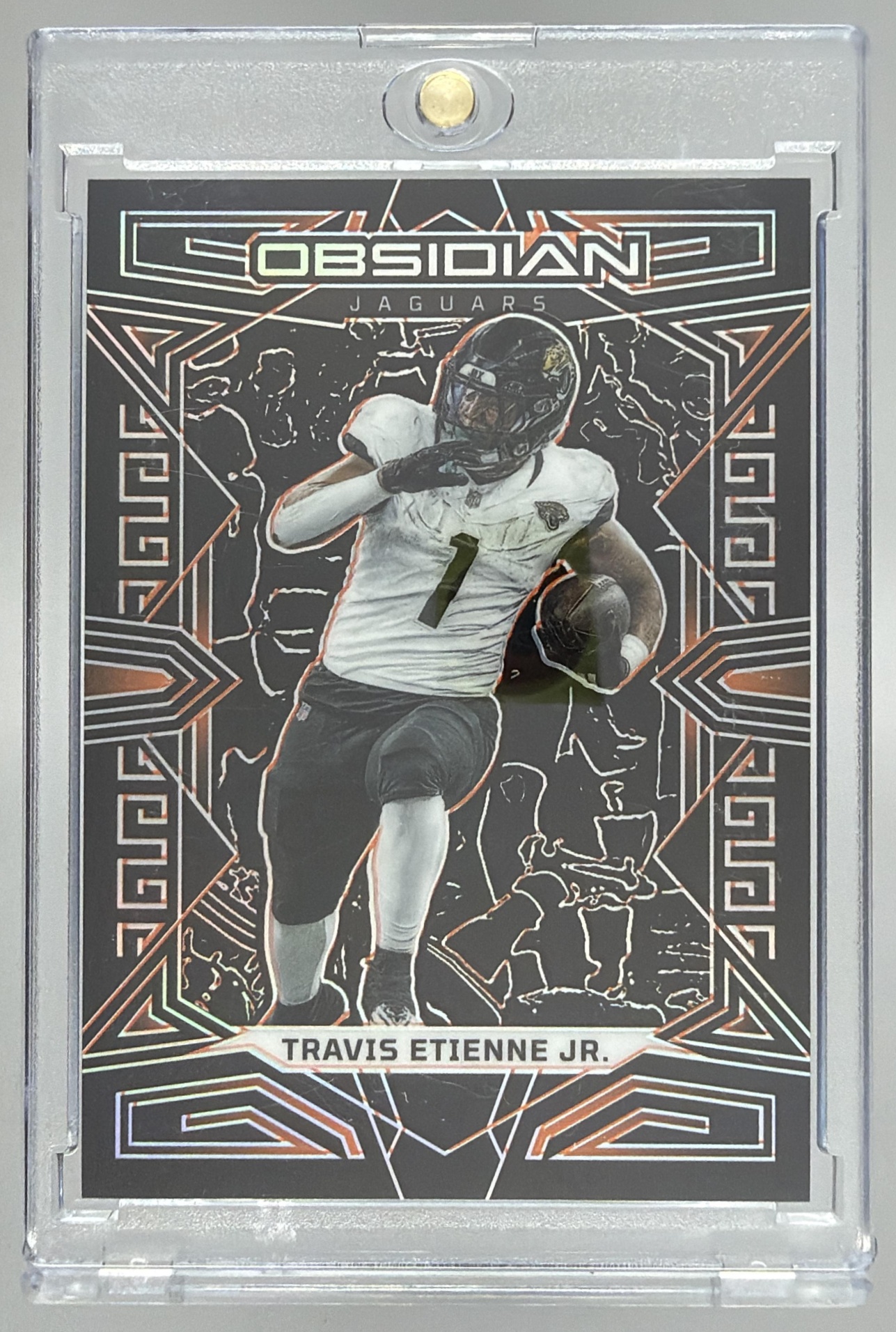 Card image for 2023 Panini Obsidian Travis Etienne Jr. Electric Etch Orange /49 #45 Jaguars