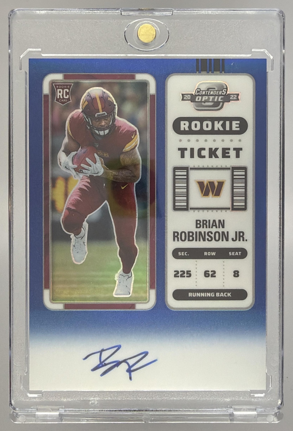 Card image for 2022 Panini Contenders Optic Brian Robinson Jr. Blue /75 #106 Rookie Ticket RPS Auto RC Commanders