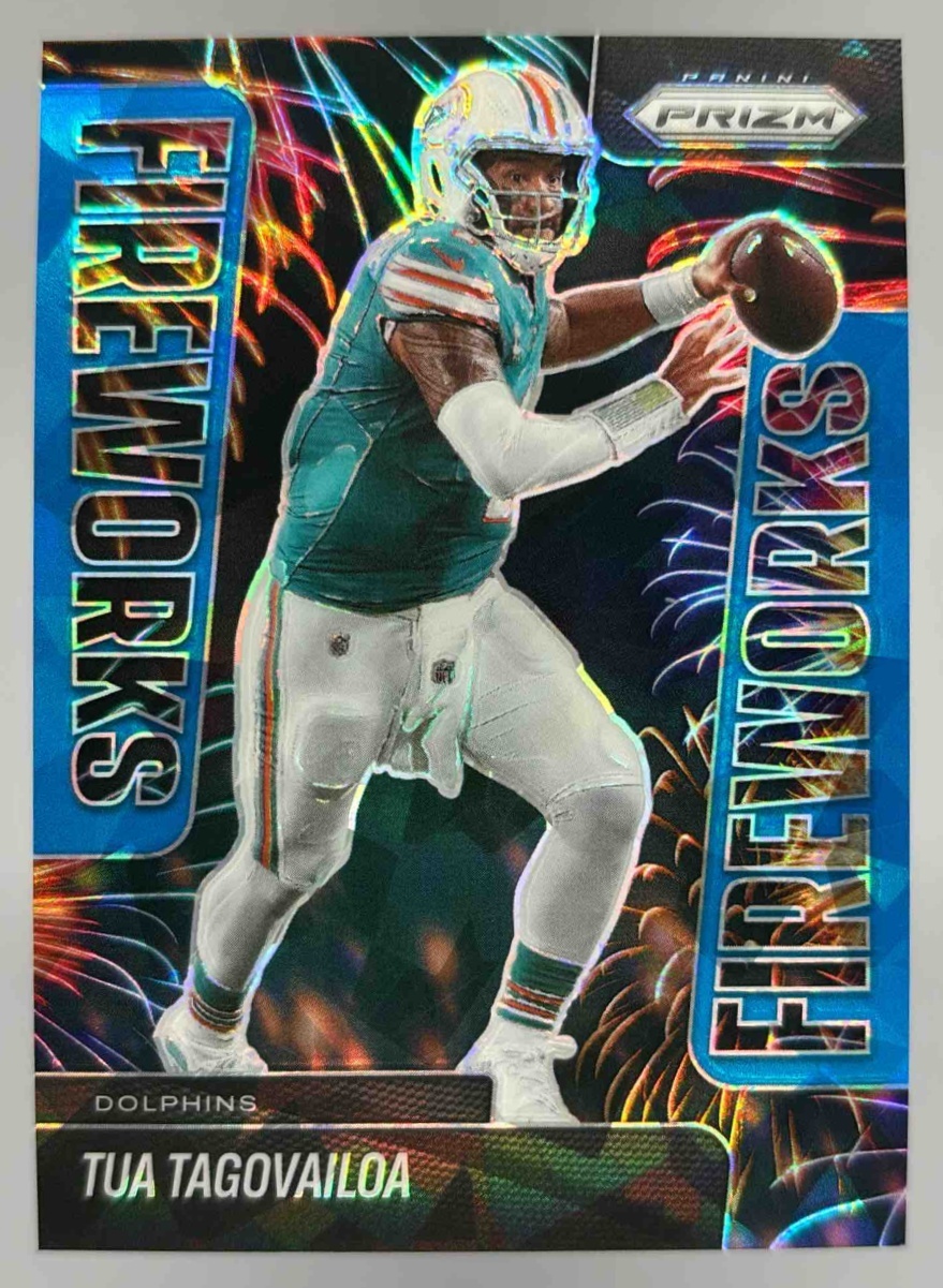 Card image for 2025 Panini Prizm Tua Tagovailoa Fireworks Blue Ice /99 #9 Dolphins