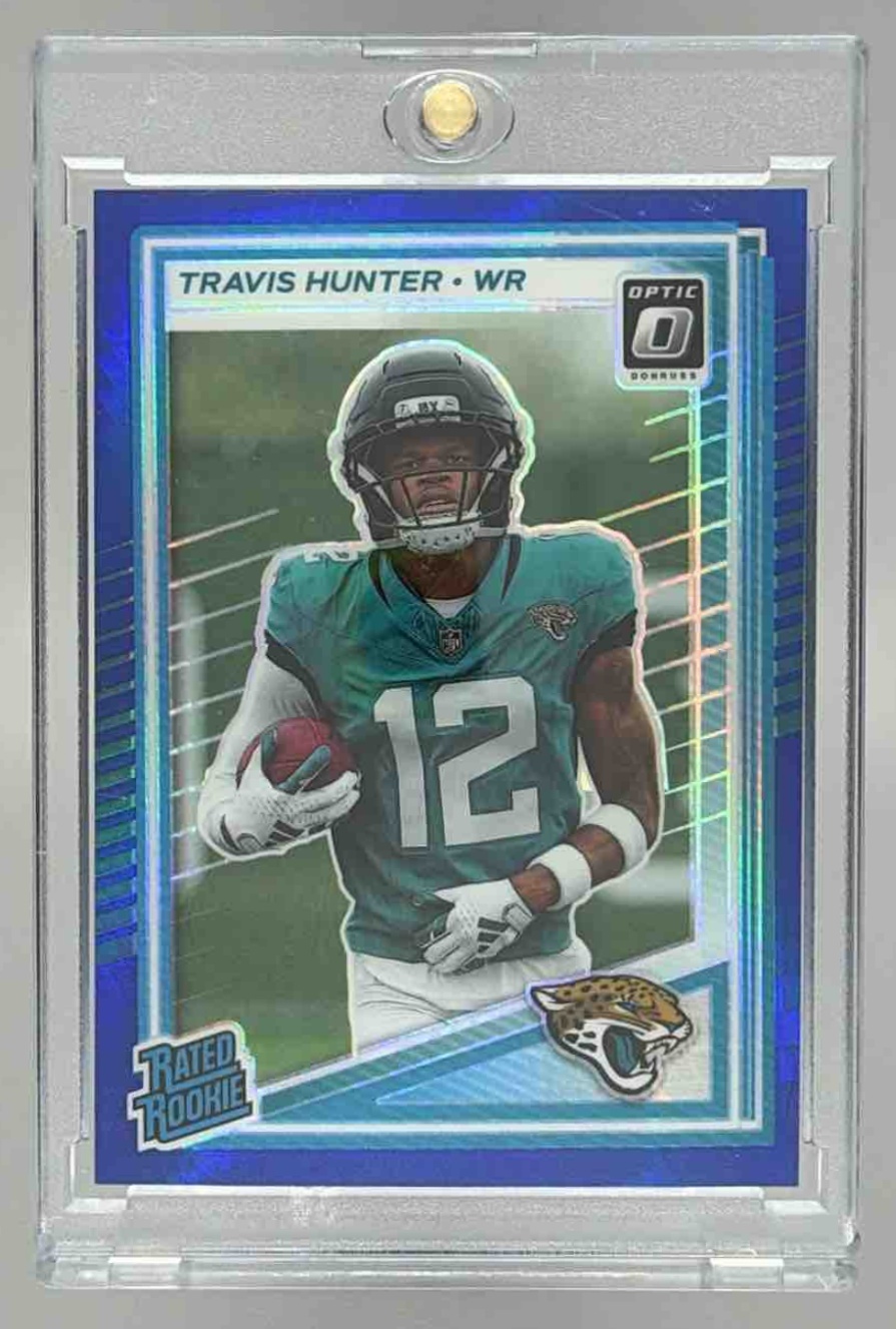 Card image for 2025 Panini Donruss Optic Travis Hunter Rated Rookie Holo Prizm #201 Jaguars