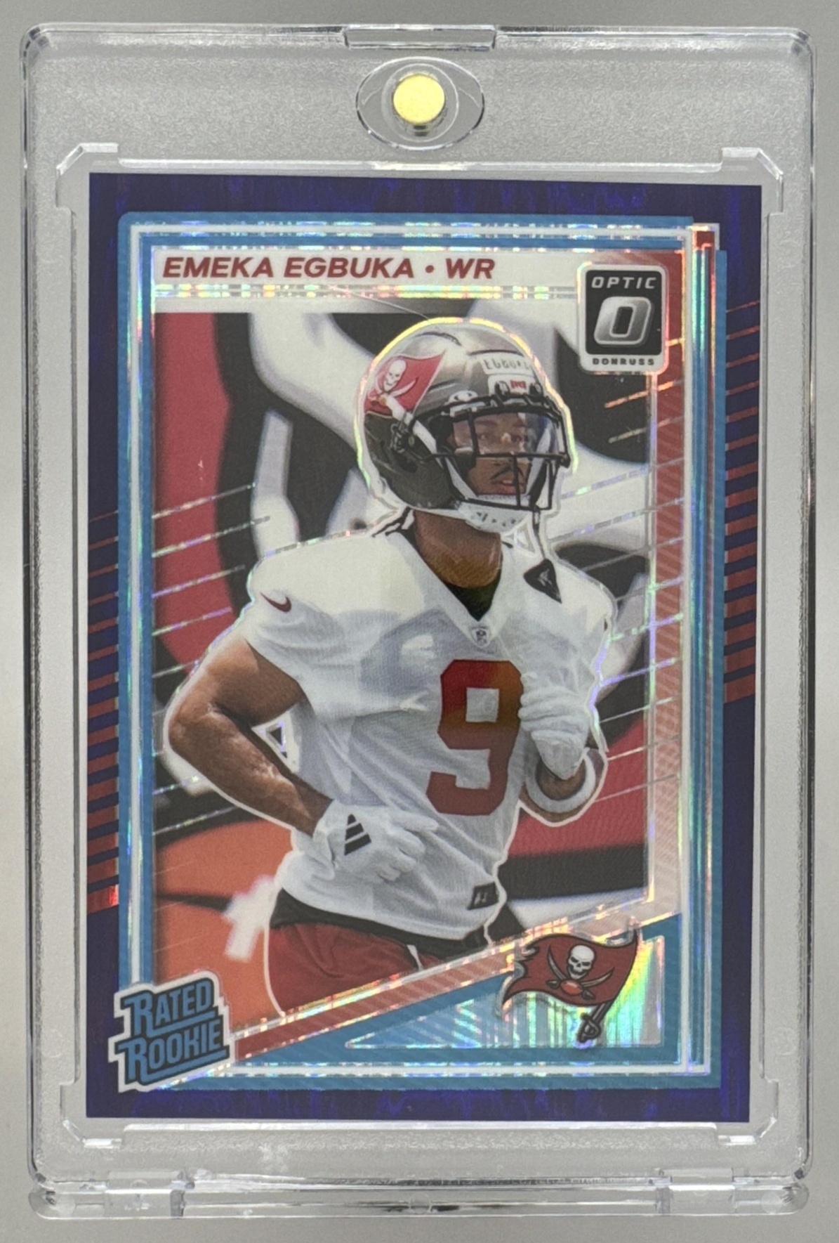 Card image for 2025 Panini Donruss Optic Emeka Egbuka Rated Rookie Purple Shock Prizm #265 Buccaneers