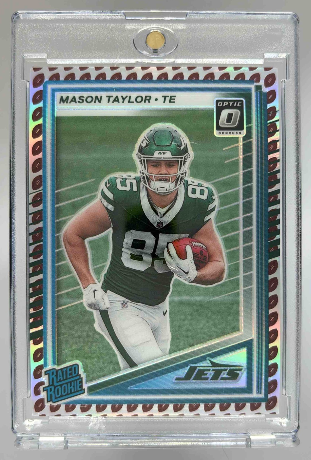 Card image for 2025 Panini Donruss Mason Taylor Optic Rated Rookie Preview Football Emoji #328 RC Jets