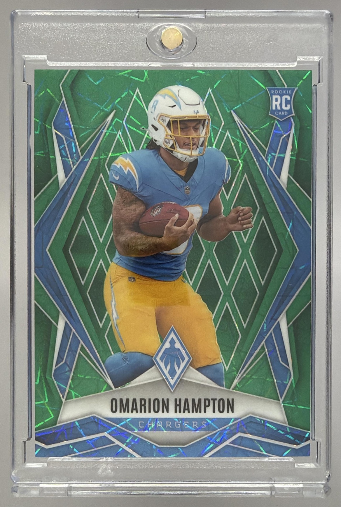 Card image for 2025 Panini Phoenix Omarion Hampton Green Lazer Prizm /49 #192 RC Chargers