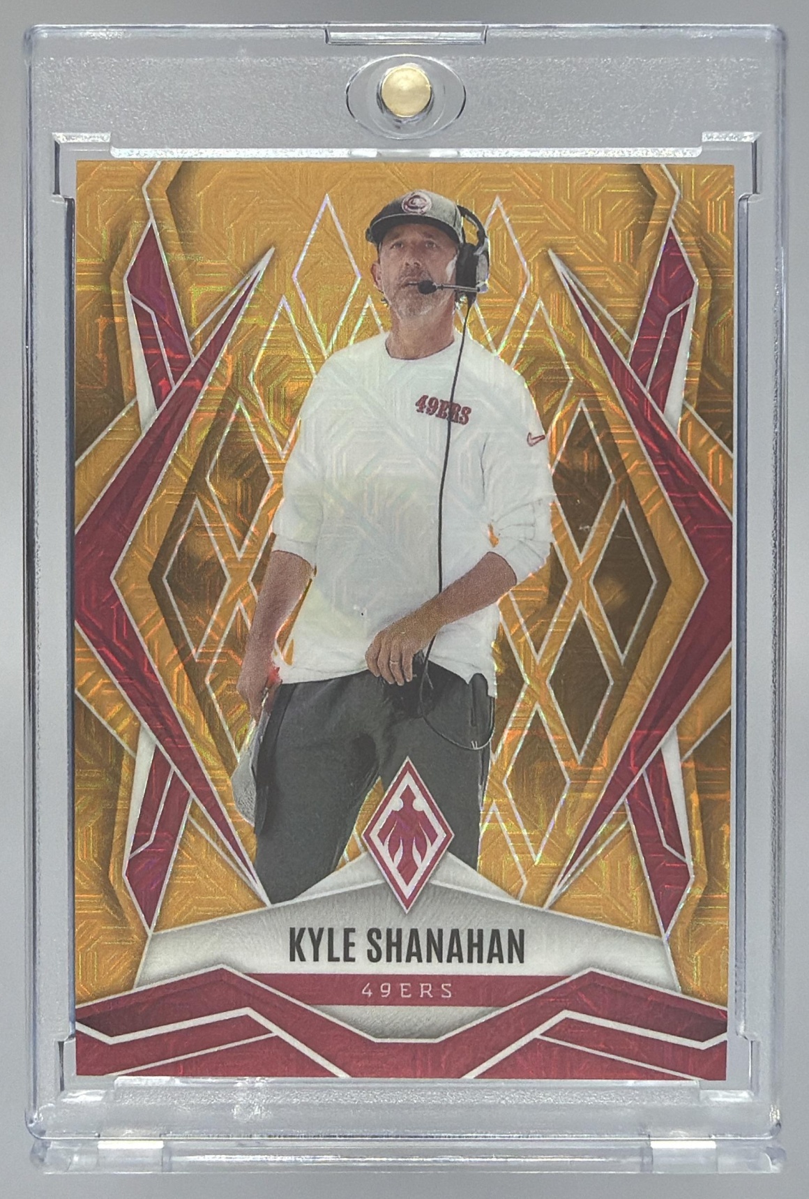 Card image for 2025 Panini Phoenix Kyle Shanahan Gold Mojo Prizm /10 #120 49ers