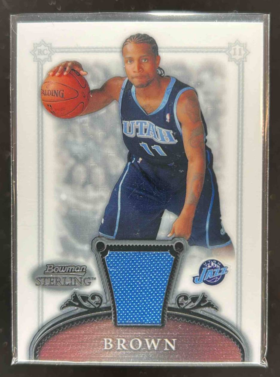 Card image for 2006-07 BOWMAN STERLING DEE BROWN #67 MEM RC ROOKIE UTAH JAZZ