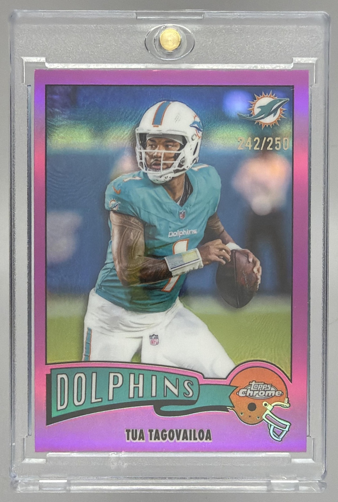 Card image for 2025 Topps Chrome Tua Tagovailoa 1975 Pink Refractor /250 #1975-21 Dolphins
