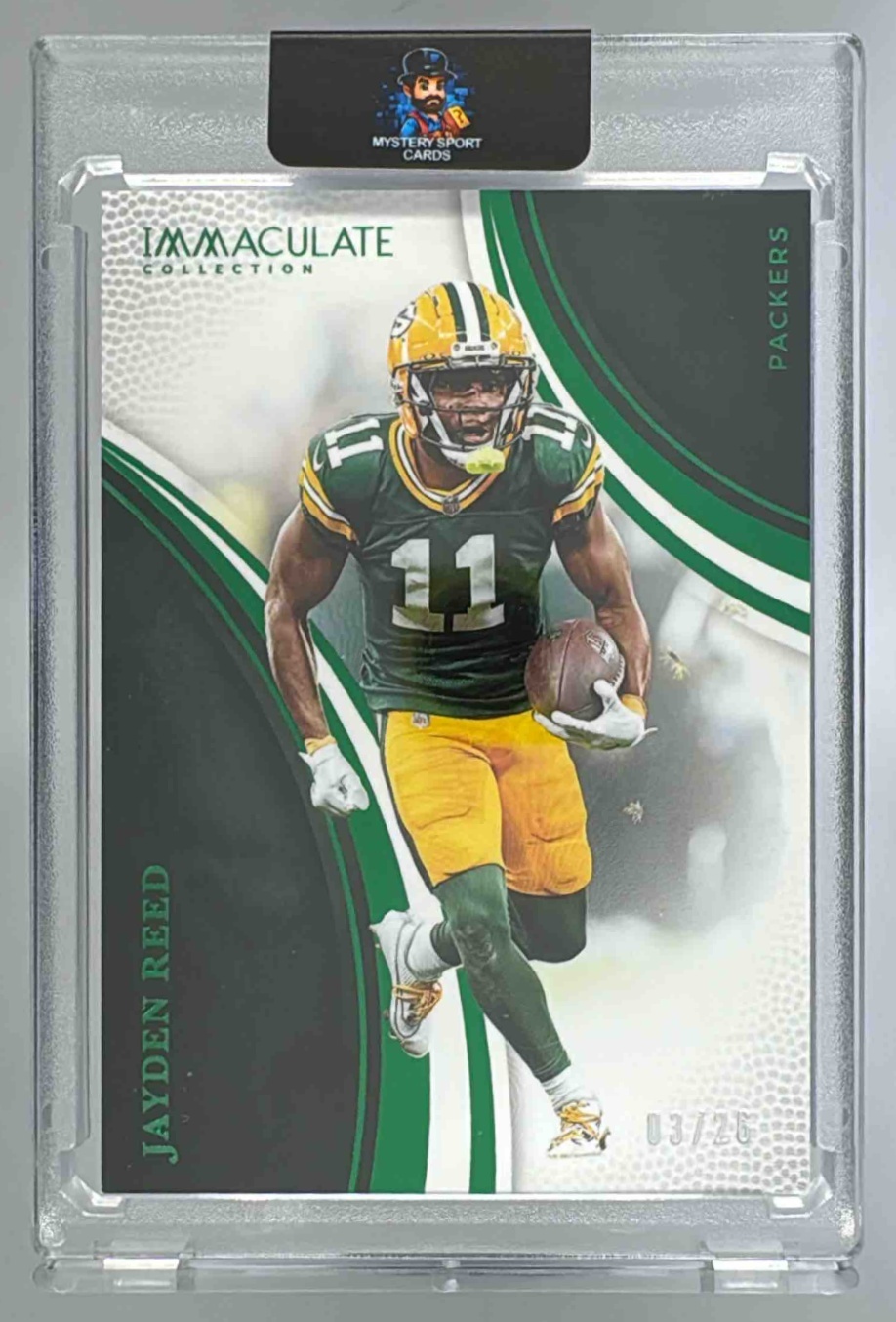 Card image for 2025 Panini Immaculate Collection Jayden Reed Emerald /26 #40 Action Variation Packers