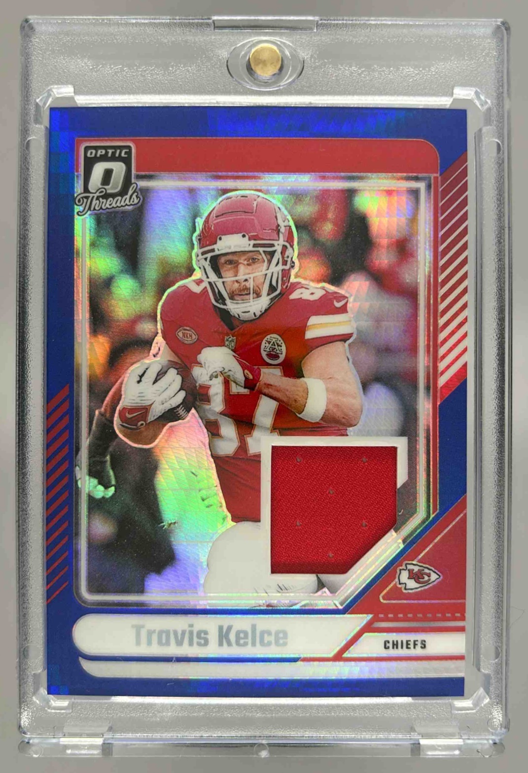Card image for 2024 Panini Donruss Optic Travis Kelce Threads Blue Hyper #DTB-TKE MEM Chiefs