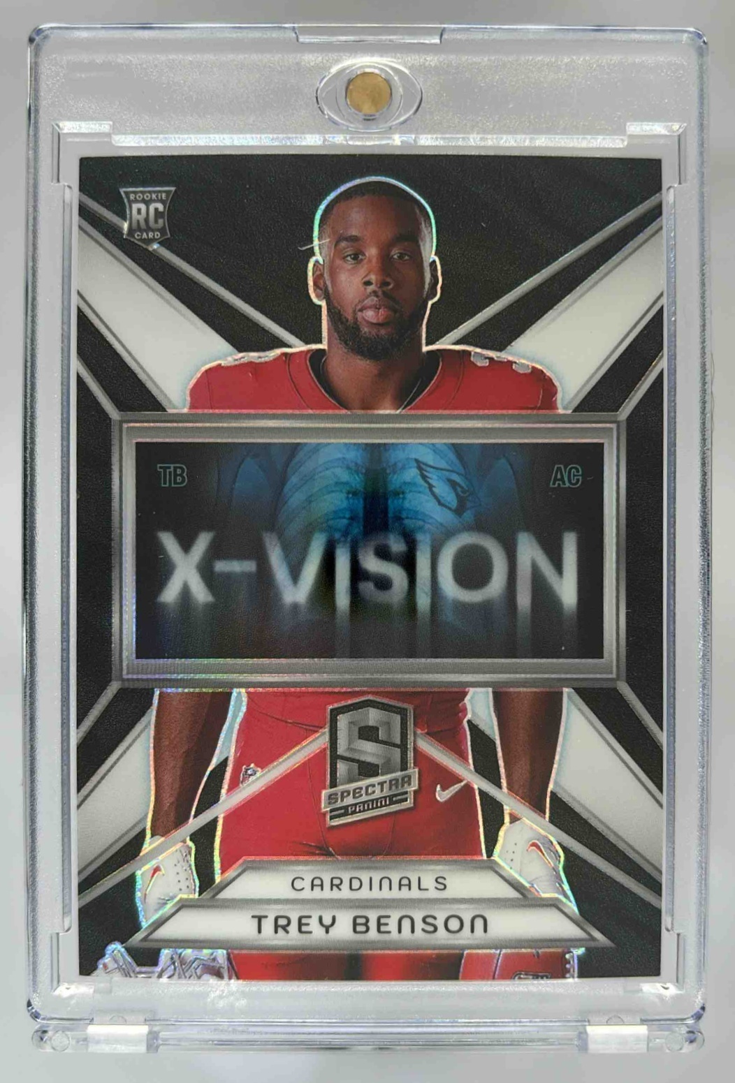 Card image for 2024 Panini Spectra Trey Benson X-Vision /125 #XV-TBN RC Cardinals