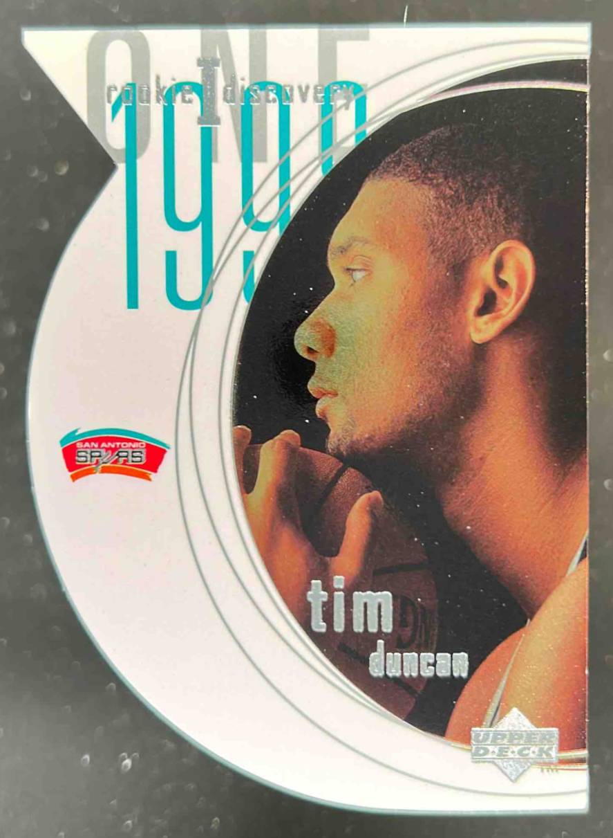Card image for 1997-98 UPPER DECK TIM DUNCAN ROOKIE DISCOVERY I #R1 RC ROOKIE SAN ANTONIO SPURS