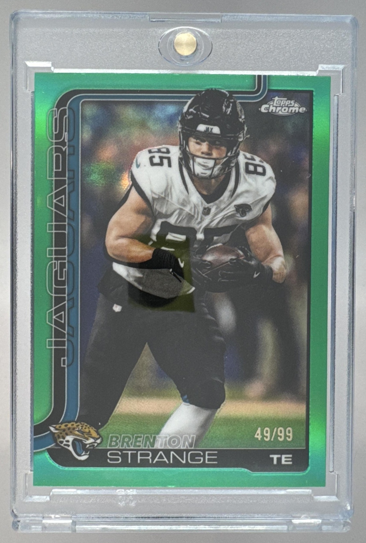 Card image for 2025 Topps Chrome Brenton Strange Football Leather Green Refractor /99 #137 Jaguars