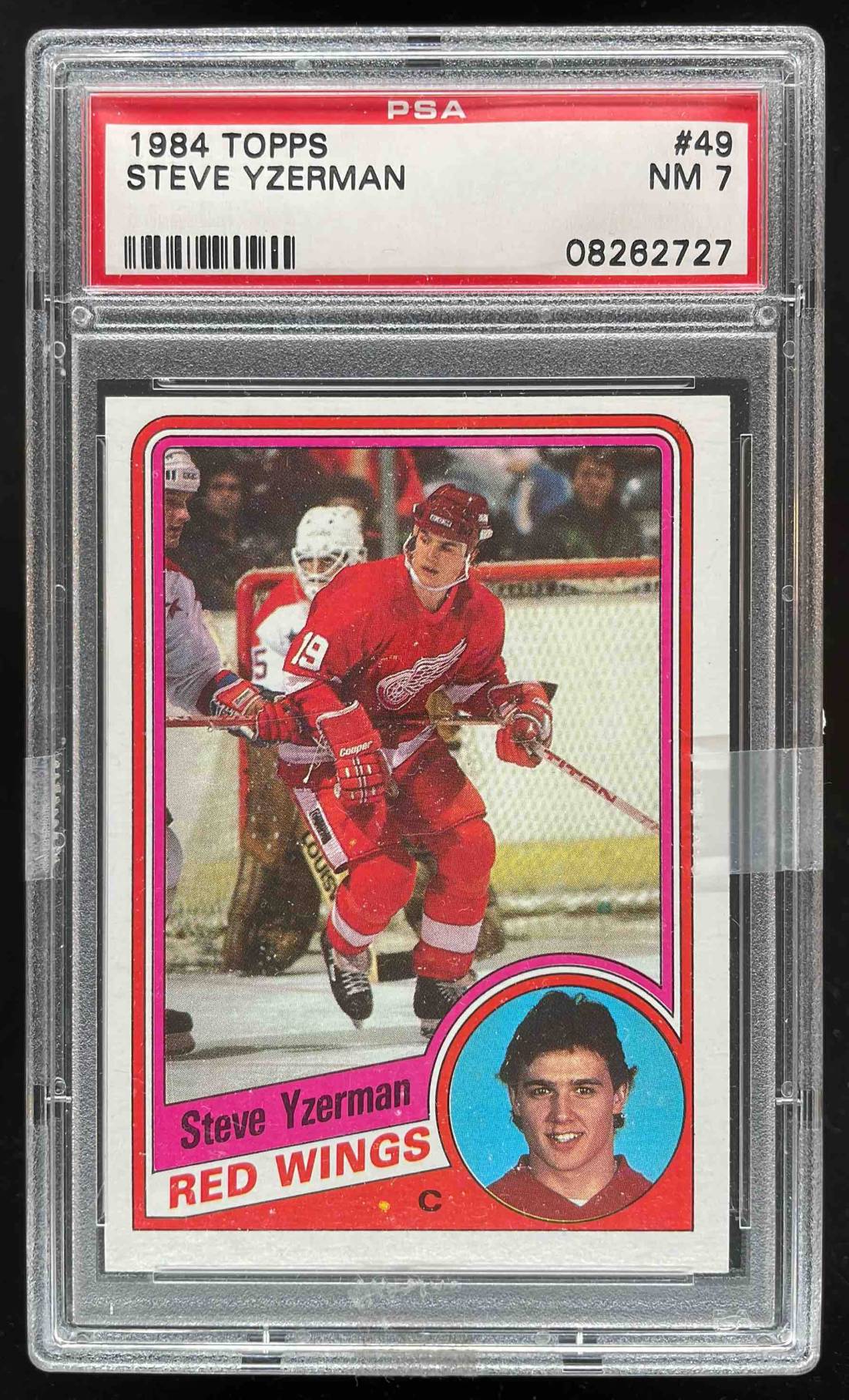 Card image for 1984-85 TOPPS STEVE YZERMAN #49 RC PSA 7 NM ROOKIE DETROIT RED WINGS