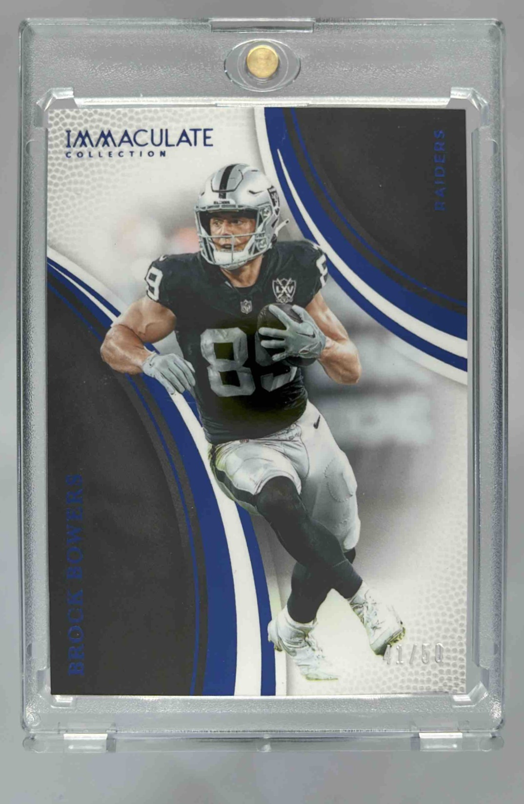 Card image for 2025 Panini Immaculate Collection Brock Bowers Blue /50 #45 Action Variation Raiders