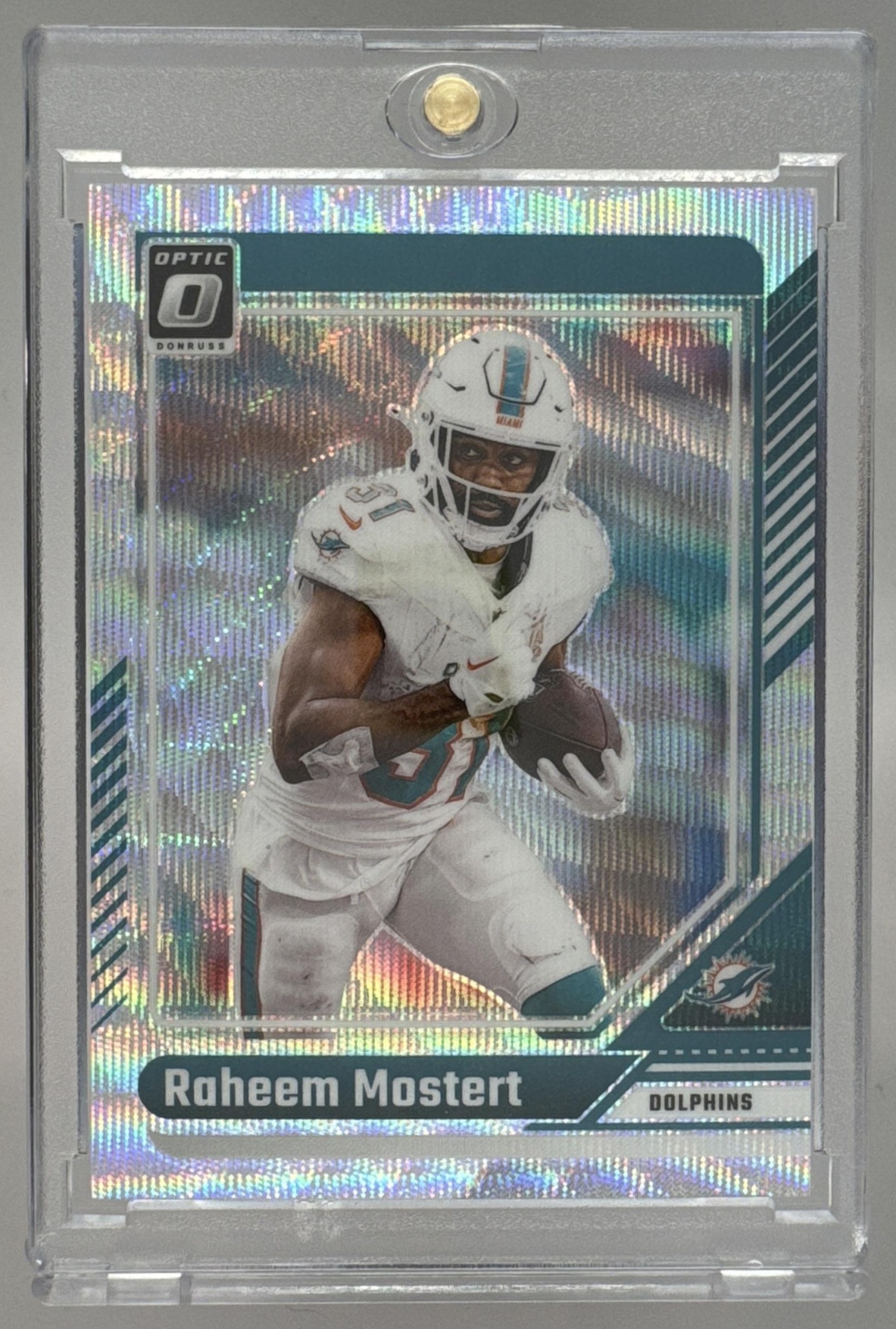 Card image for 2024 Panini Football Donruss Optic Raheem Mostert Wave /300 #121 Miami Dolphins