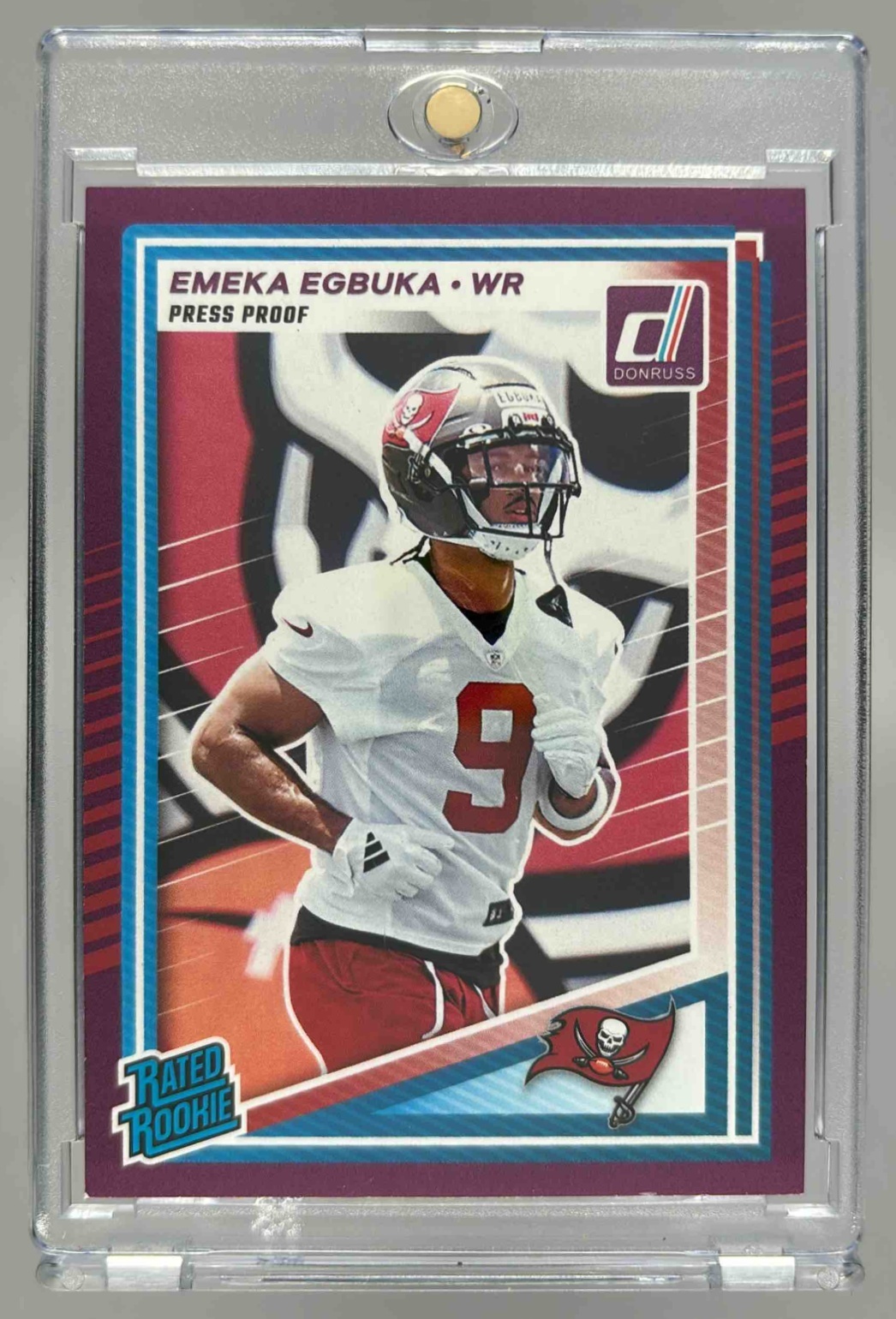 Card image for 2025 Panini Donruss Emeka Egbuka Rated Rookie Press Proof Purple #375 RC Buccaneers