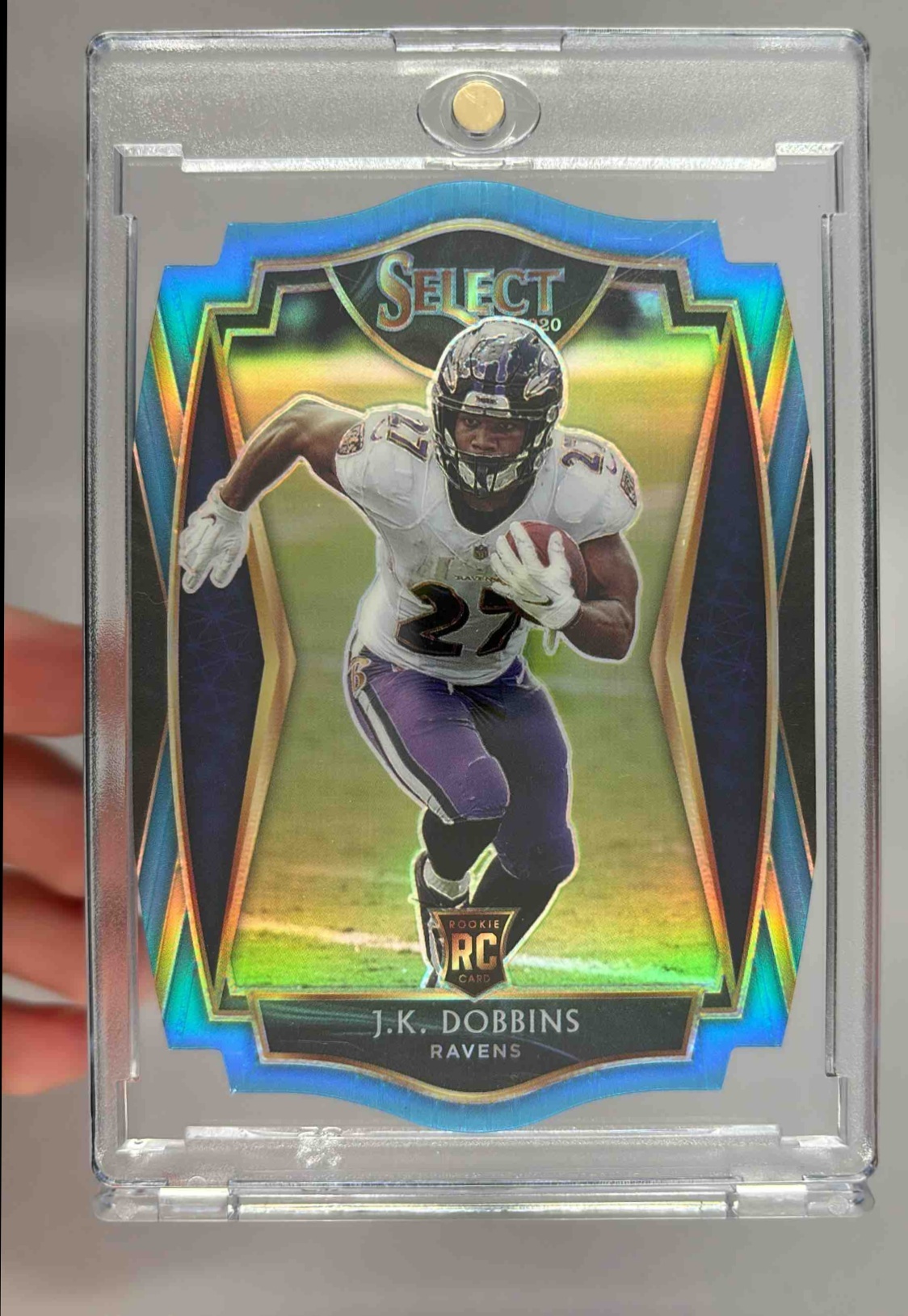 Card image for 2020 Panini Select J.K. Dobbins Light Blue Prizm Die Cut #152 RC Premier Ravens