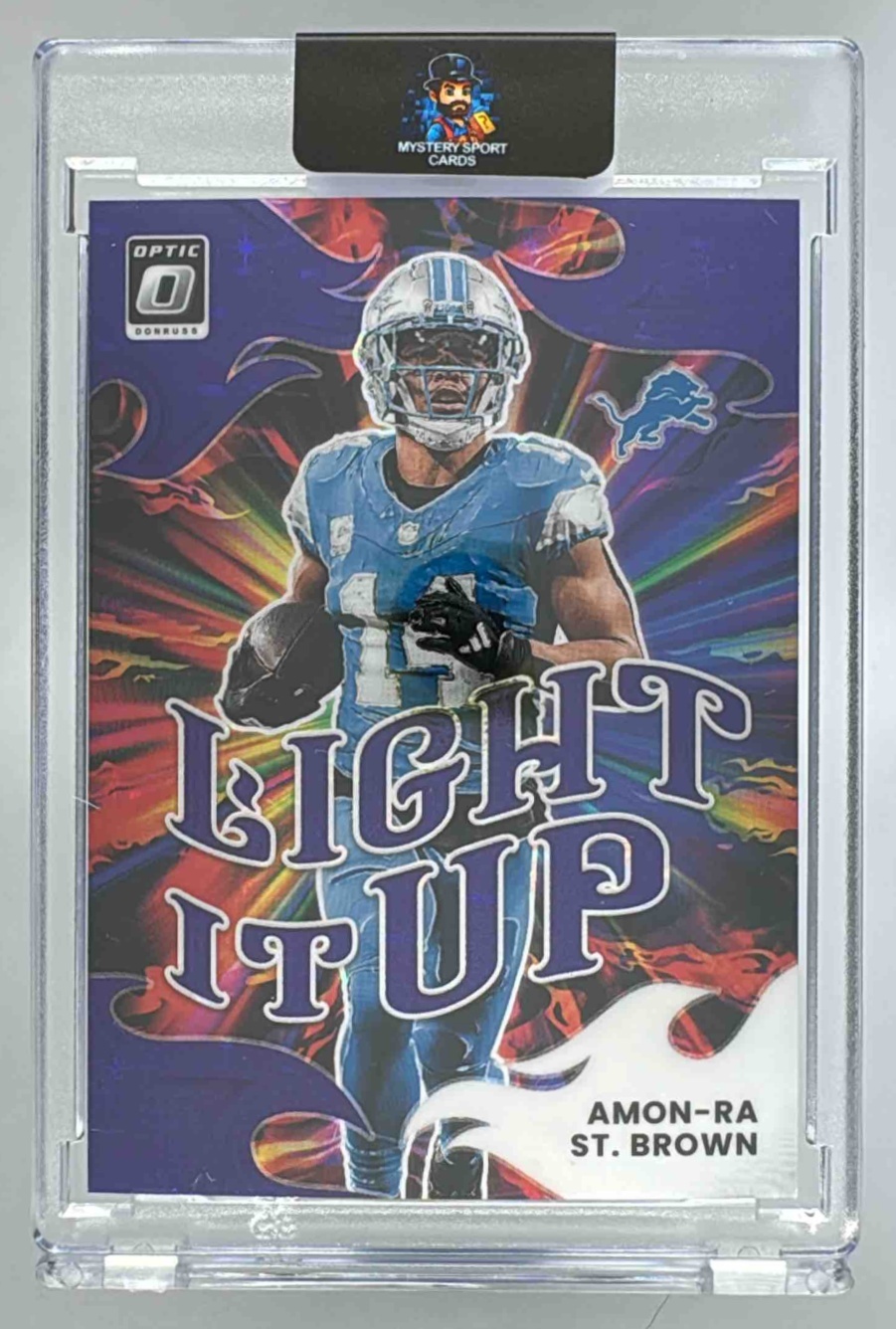 Card image for 2025 Panini Donruss Optic Amon-Ra St. Brown Light It Up Purple Stars Prizm /25 #15 Lions