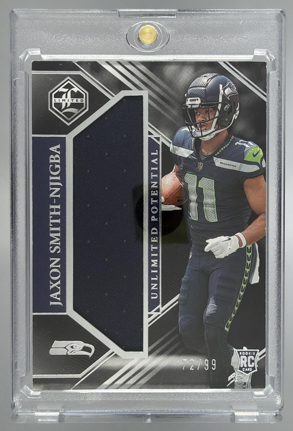 Card image for 2023 Panini Limited Jaxon Smith-Njigba Unlimited Potential Silver Spotlight /99 #LP-JSN MEM RC Seahawks