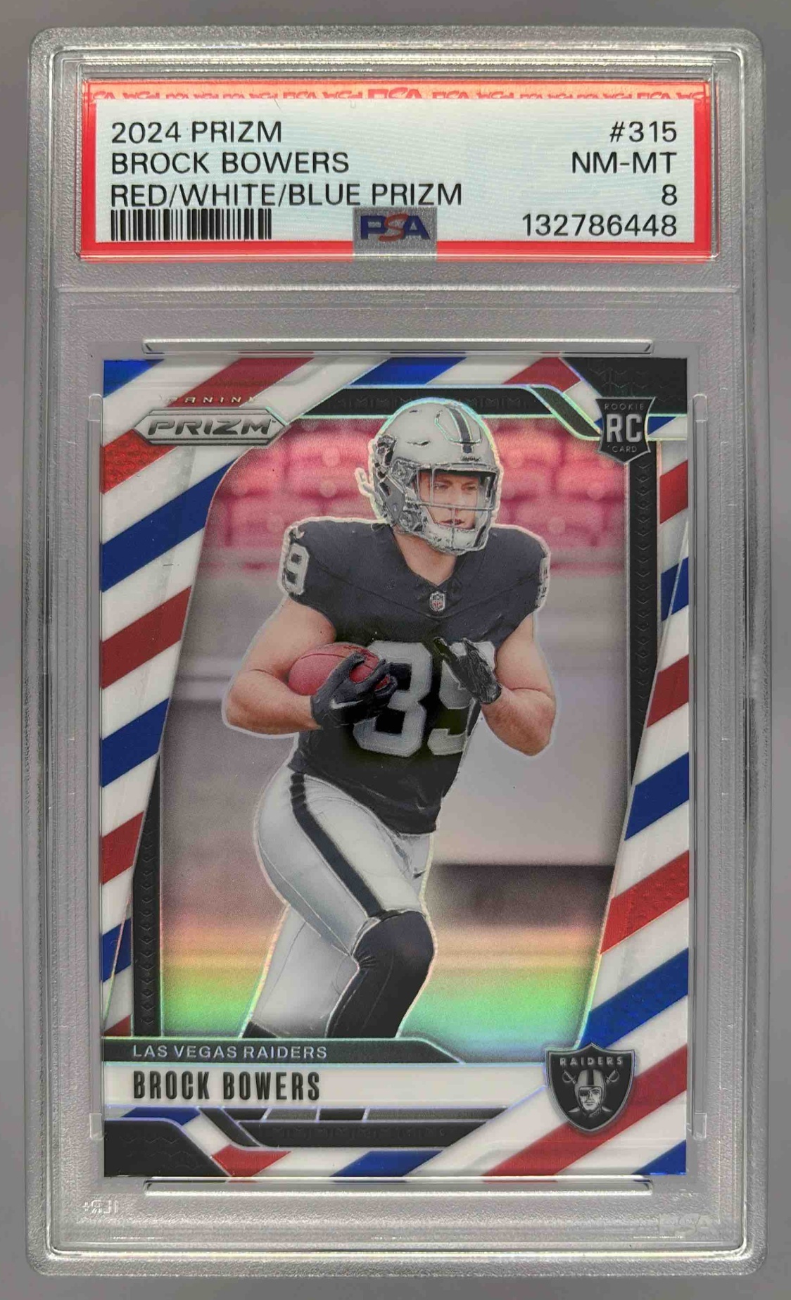 Card image for 2024 Panini Prizm Brock Bowers Red White and Blue #315 RC Raiders