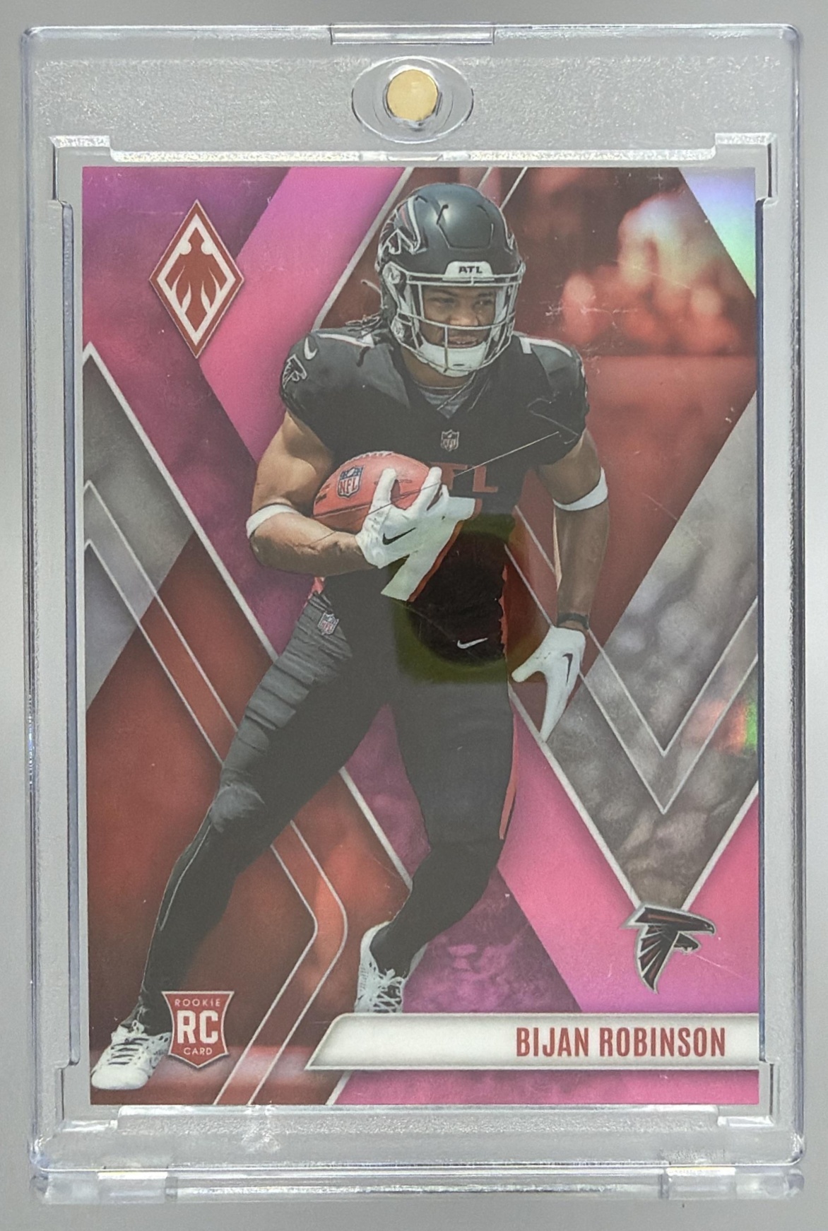 Card image for 2023 Panini Football Phoenix Bijan Robinson Pink /199 #104 RC Atlanta Falcons