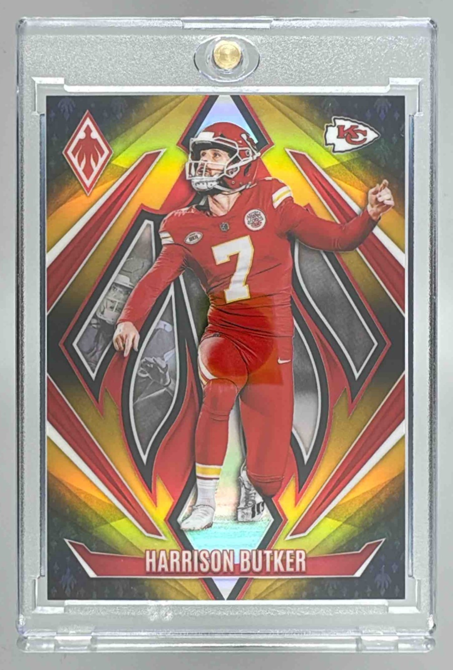 Card image for 2024 Panini Phoenix Harrison Butker Bronze Fade /125 #66 Chiefs