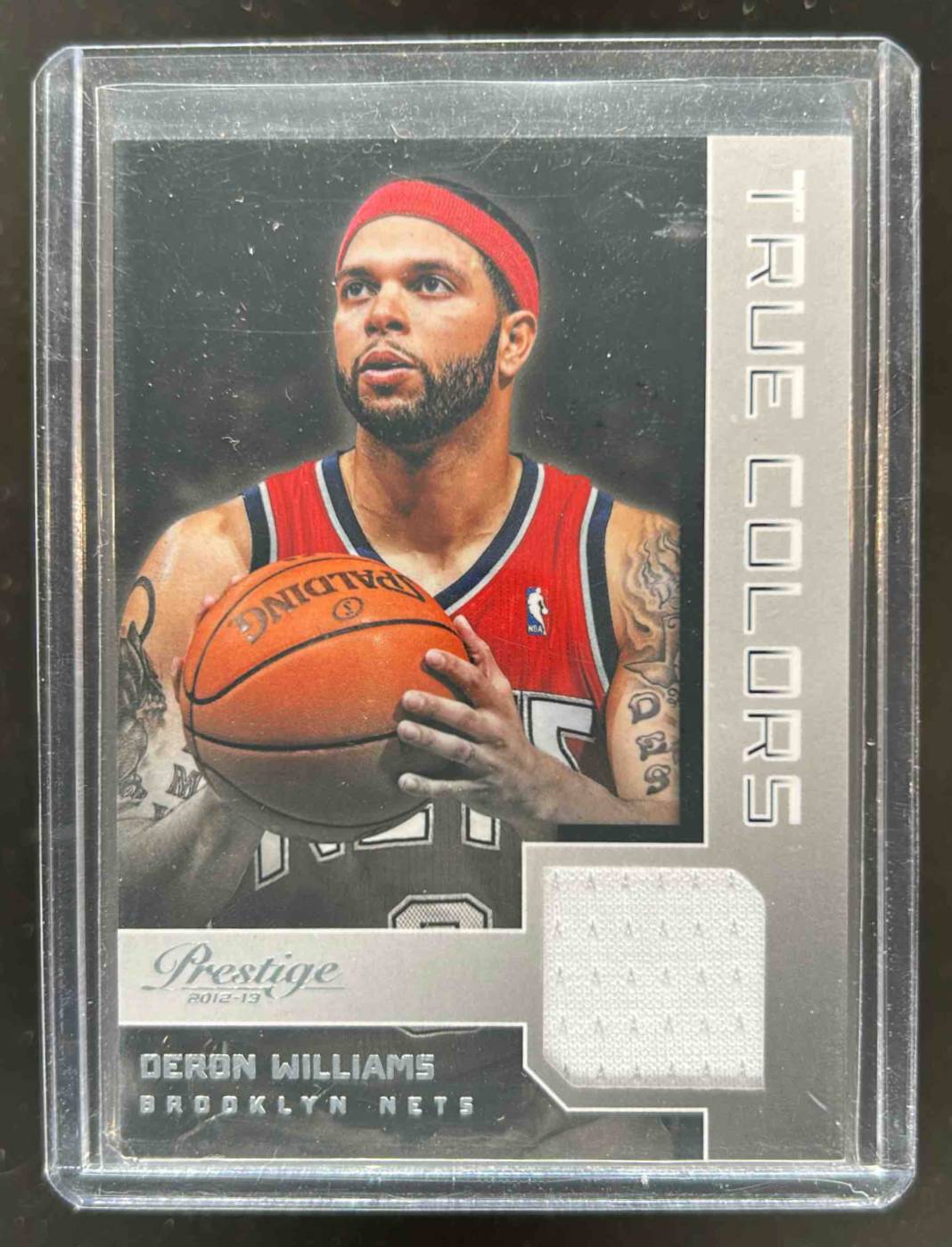 Card image for 2012-13 PANINI PRESTIGE DERON WILLIAMS TRUE COLORS MATERIALS #1