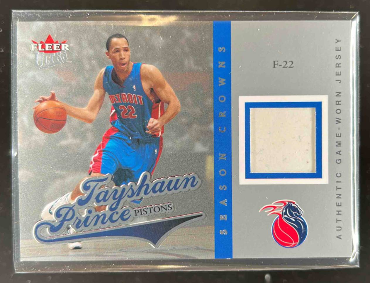 Card image for 2004-05 Fleer Ultra Tayshaun Prince Season Crowns Game Used Silver /149 #SC-TP MEM
