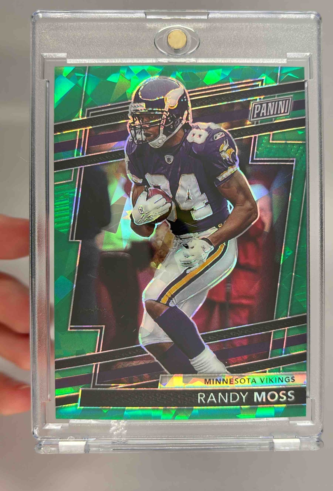 Card image for 2024 Panini National NSCC VIP Party Randy Moss Green Sparkle /99 #9 Vikings