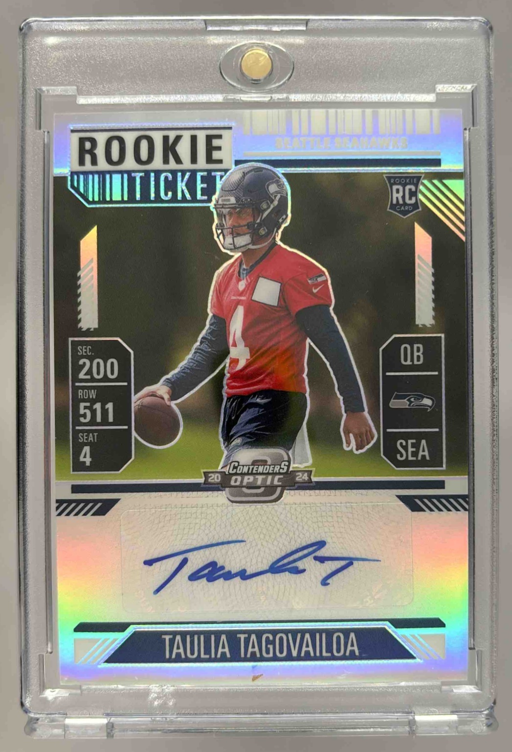 Card image for 2024 Panini Contenders Optic Taulia Tagovailoa Rookie Ticket Auto #143 RC Seahawks