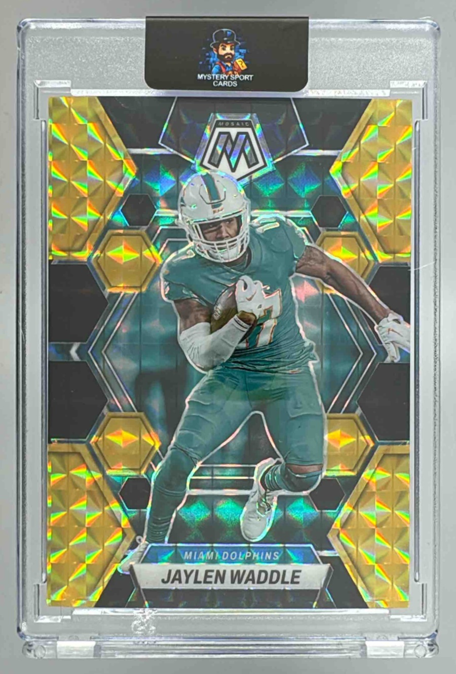 Card image for 2023 Panini Mosaic Jaylen Waddle Black Gold Choice Mosaic Prizm /8 #145 Dolphins