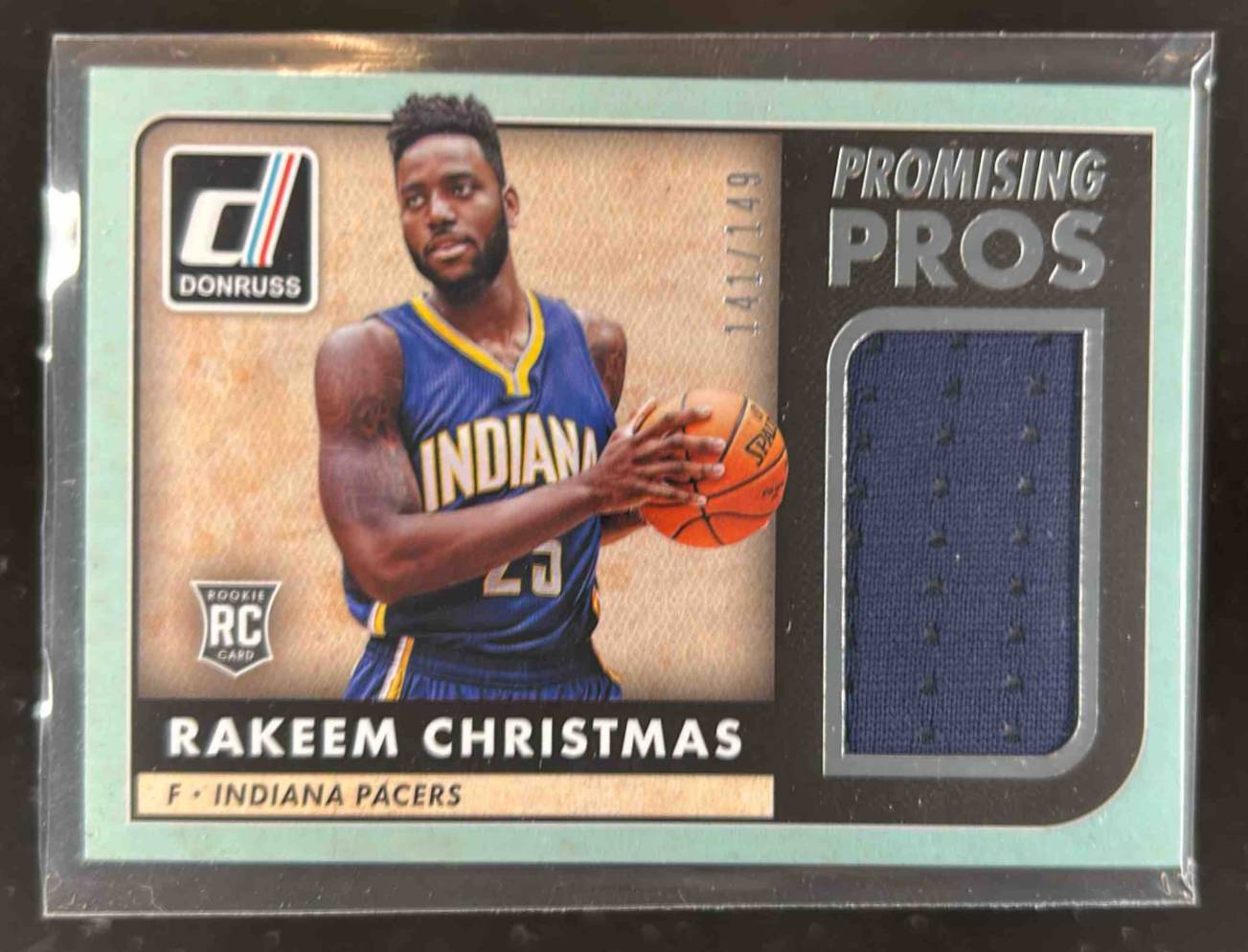 Card image for 2015-16 PANINI DONRUSS RAKEEM CHRISTMAS PROMISING PROS /149 #1 RC INDIANA PACERS