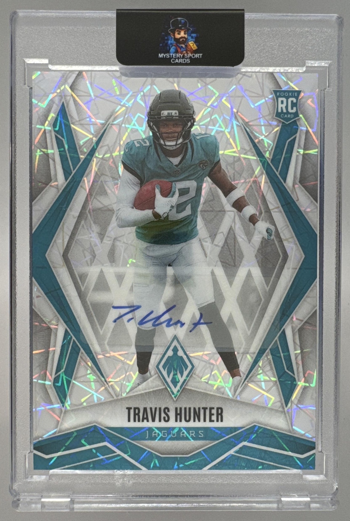 Card image for 2025 Panini Phoenix Travis Hunter Rookies Auto /199 #157 RC Jaguars