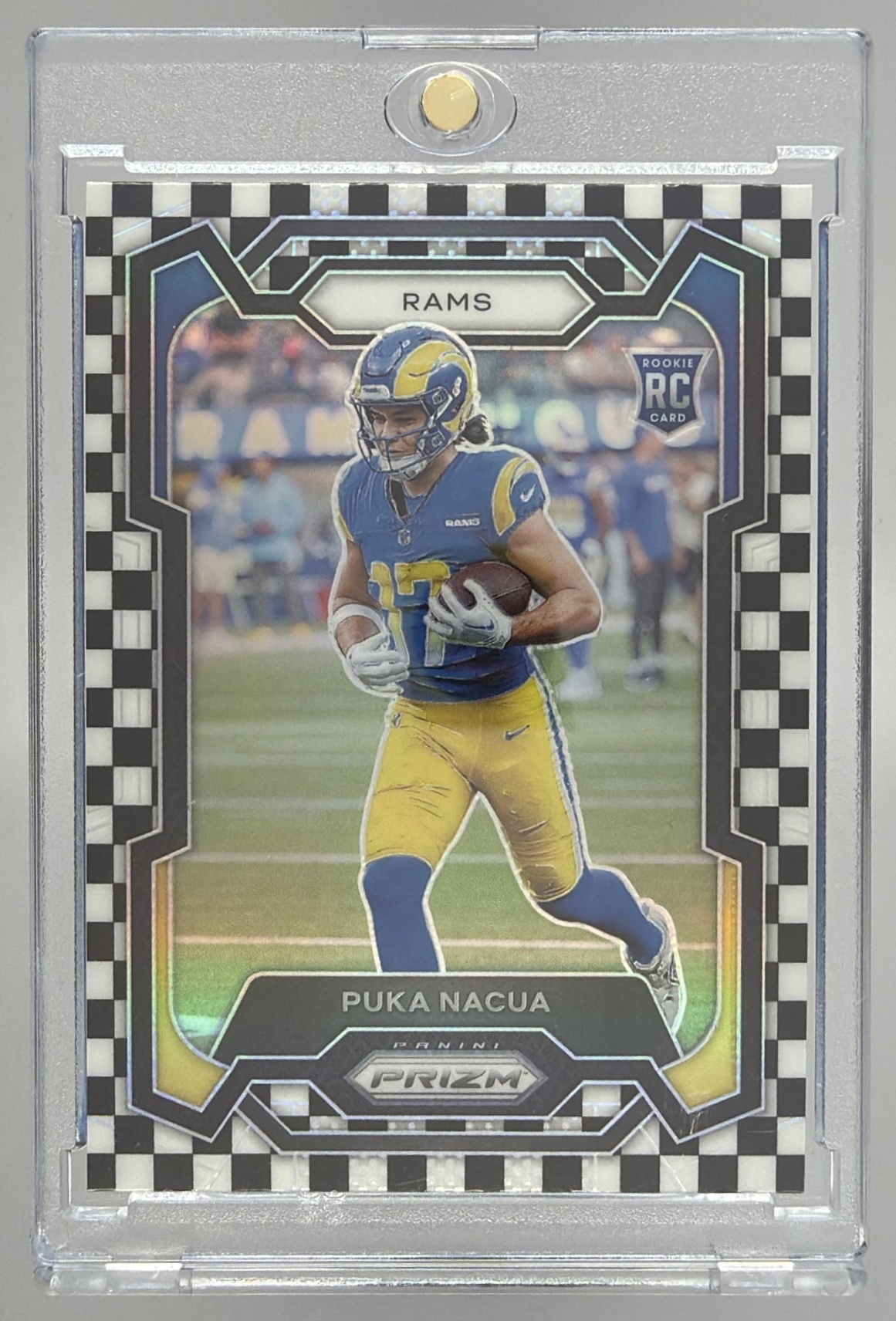 Card image for 2023 Panini Prizm Puka Nacua Black and White Checker #357 RC Rams