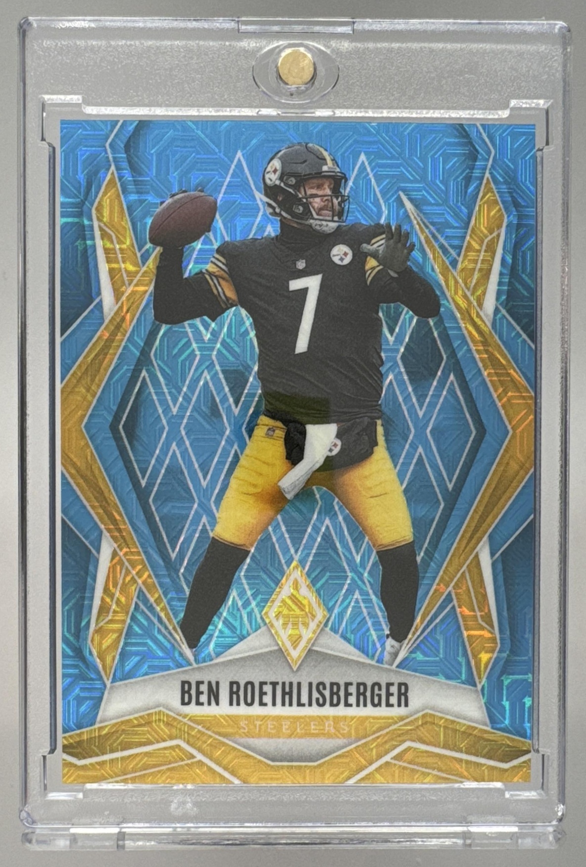 Card image for 2025 Panini Phoenix Ben Roethlisberger Light Blue Mojo Prizm /85 #89 Steelers