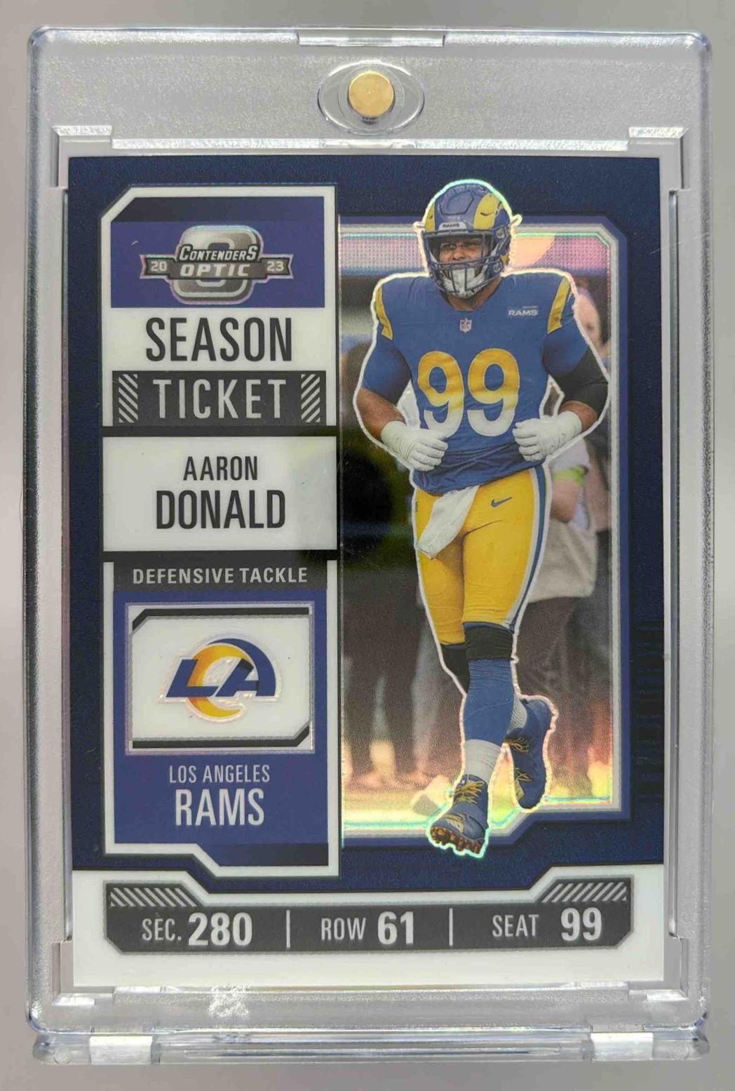 Card image for 2023 Panini Contenders Optic Aaron Donald Blue /99 #32 Season Ticket Rams