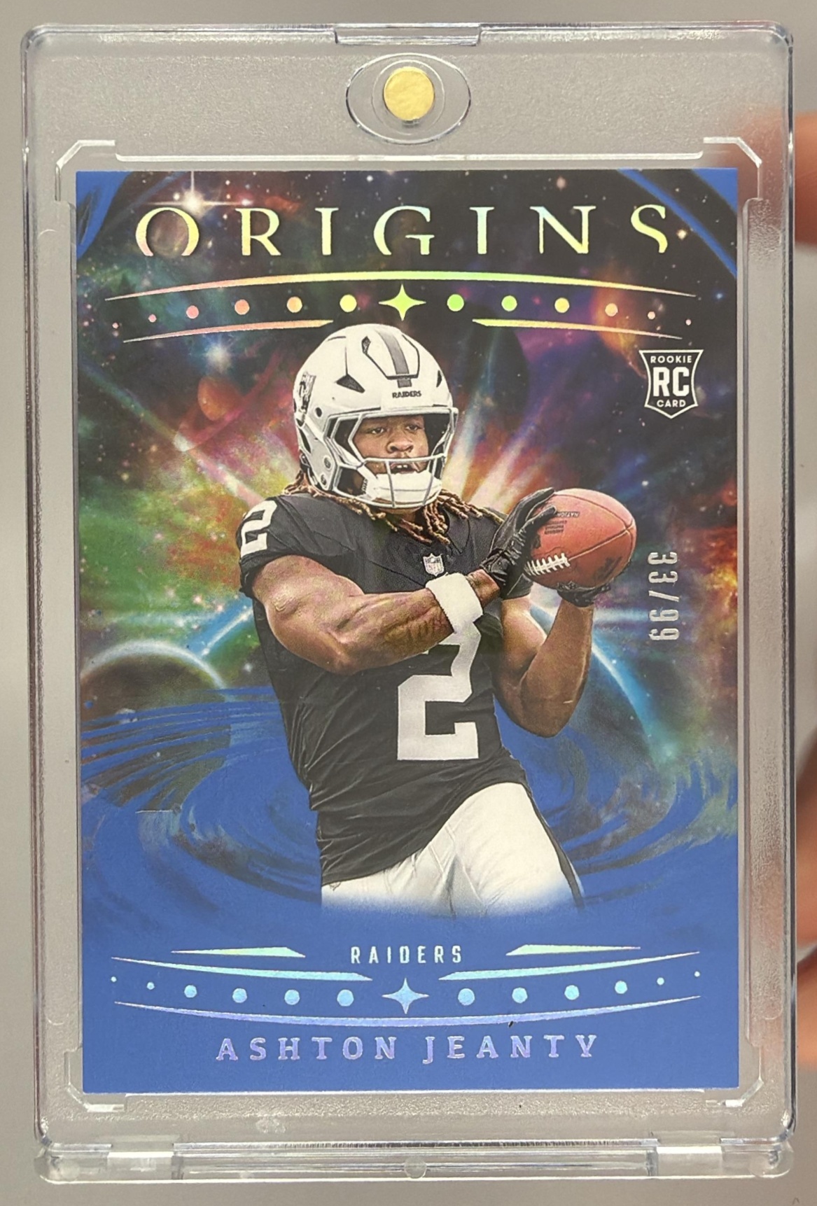 Card image for 2025 Panini Origins Ashton Jeanty Rookie Blue /99 #139 RC Raiders