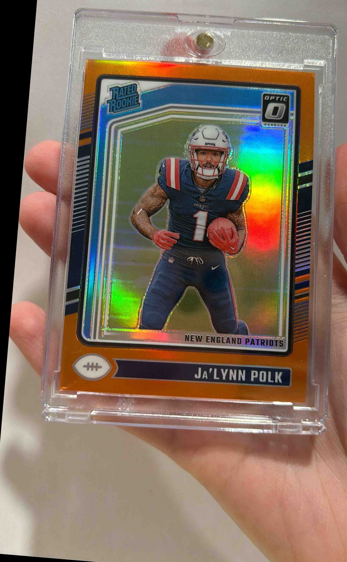 Card image for 2024 Panini Donruss Optic Ja'Lynn Polk Orange /249 #240 Rated Rookie Patriots