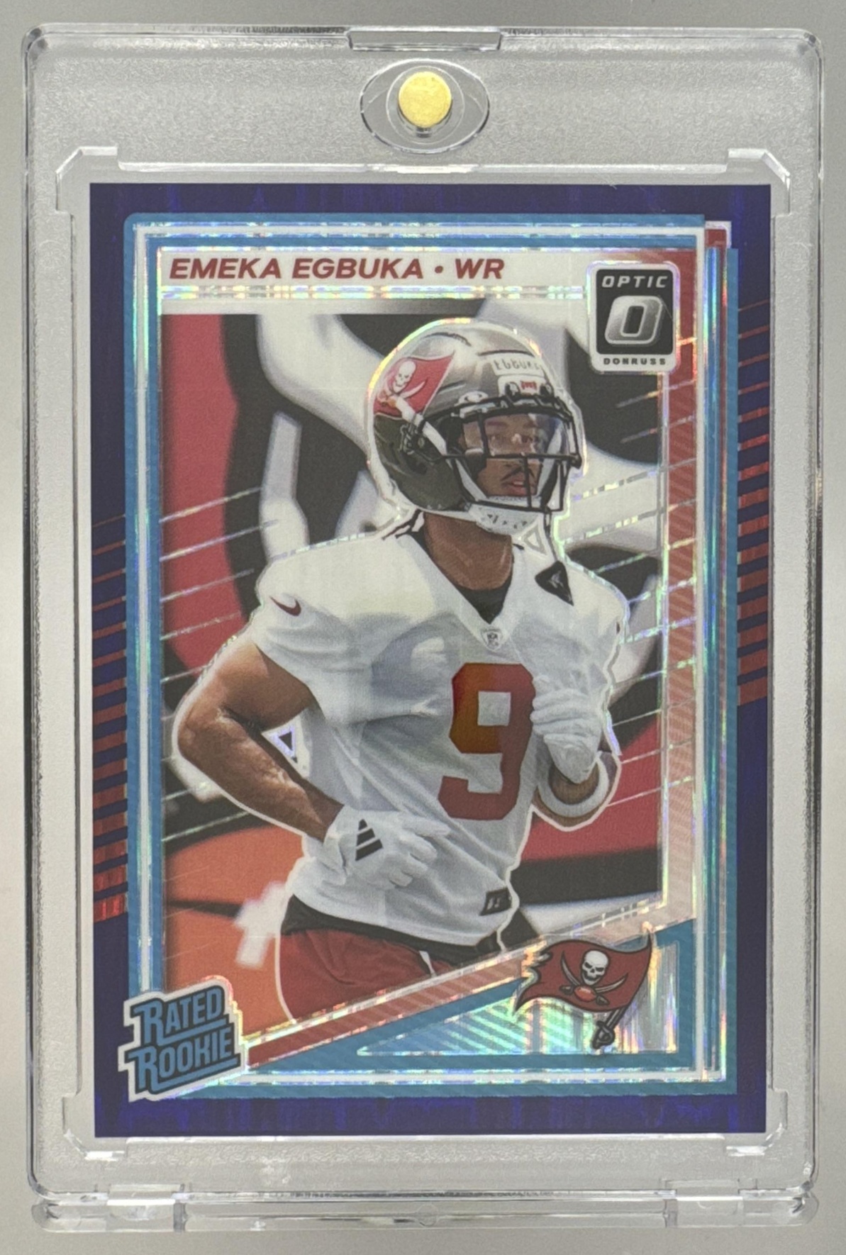 Card image for 2025 Panini Donruss Optic Emeka Egbuka Rated Rookie Purple Shock Prizm #265 Buccaneers