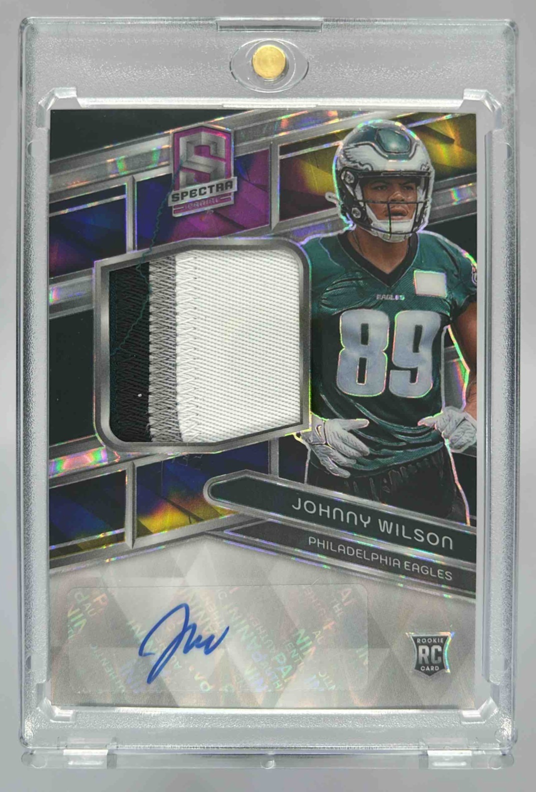 Card image for 2024 Panini Spectra Johnny Wilson Rookie Patch Auto Supernova /70 #233 RC Eagles