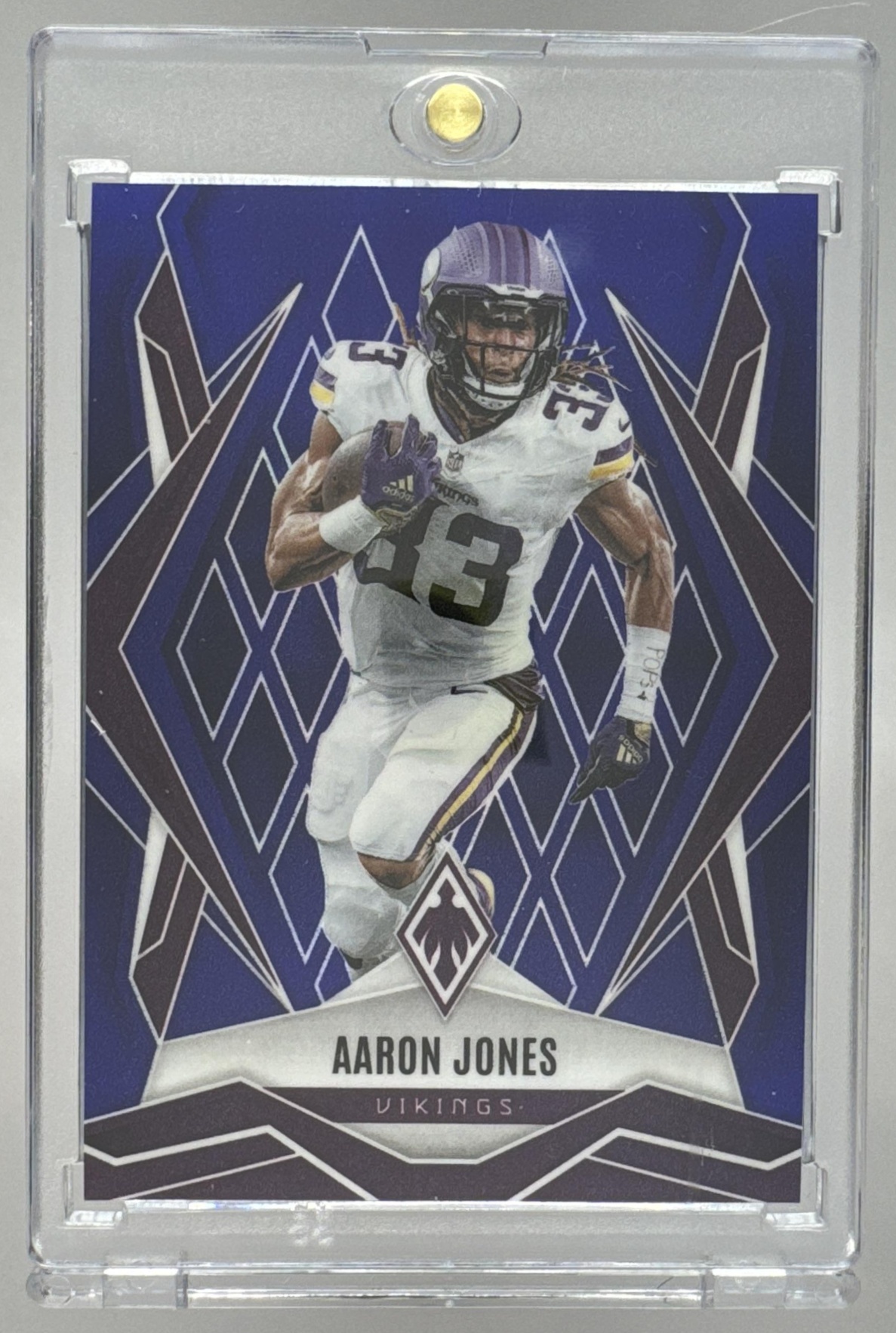 Card image for 2025 Panini Football Phoenix Aaron Jones Red Prizm /99 #85 Minnesota Vikings