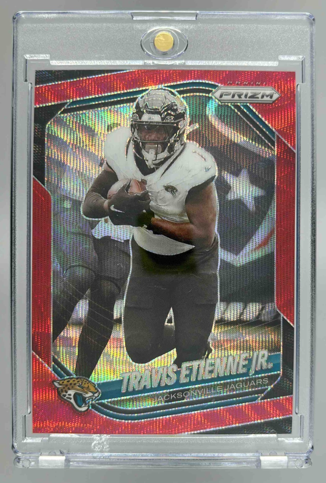 Card image for 2025 Panini Prizm Travis Etienne Jr. Red Wave /149 #68 Jaguars