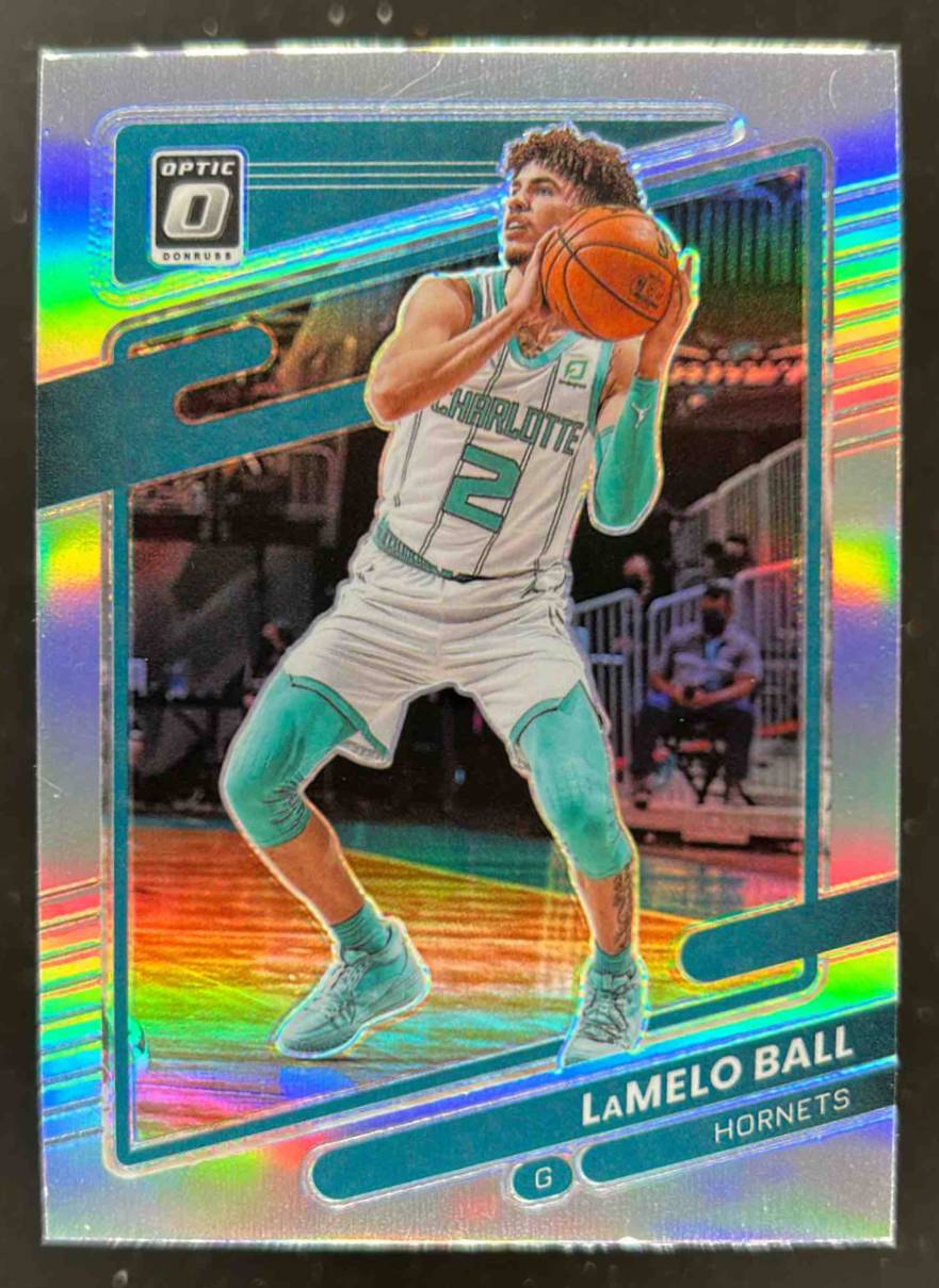 Card image for 2021-22 PANINI DONRUSS OPTIC LAMELO BALL HOLO PRIZM #26 CHARLOTTE HORNETS