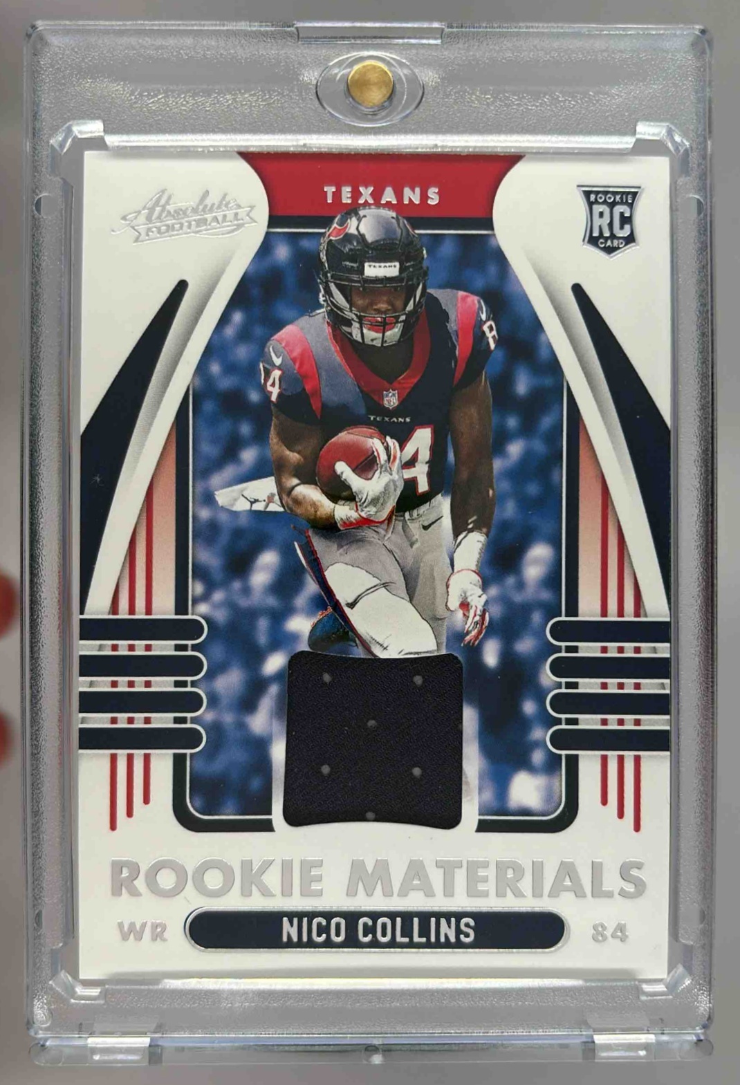 Card image for 2021 Panini Absolute Nico Collins Rookie Materials #ARM-NCO RC MEM Texans