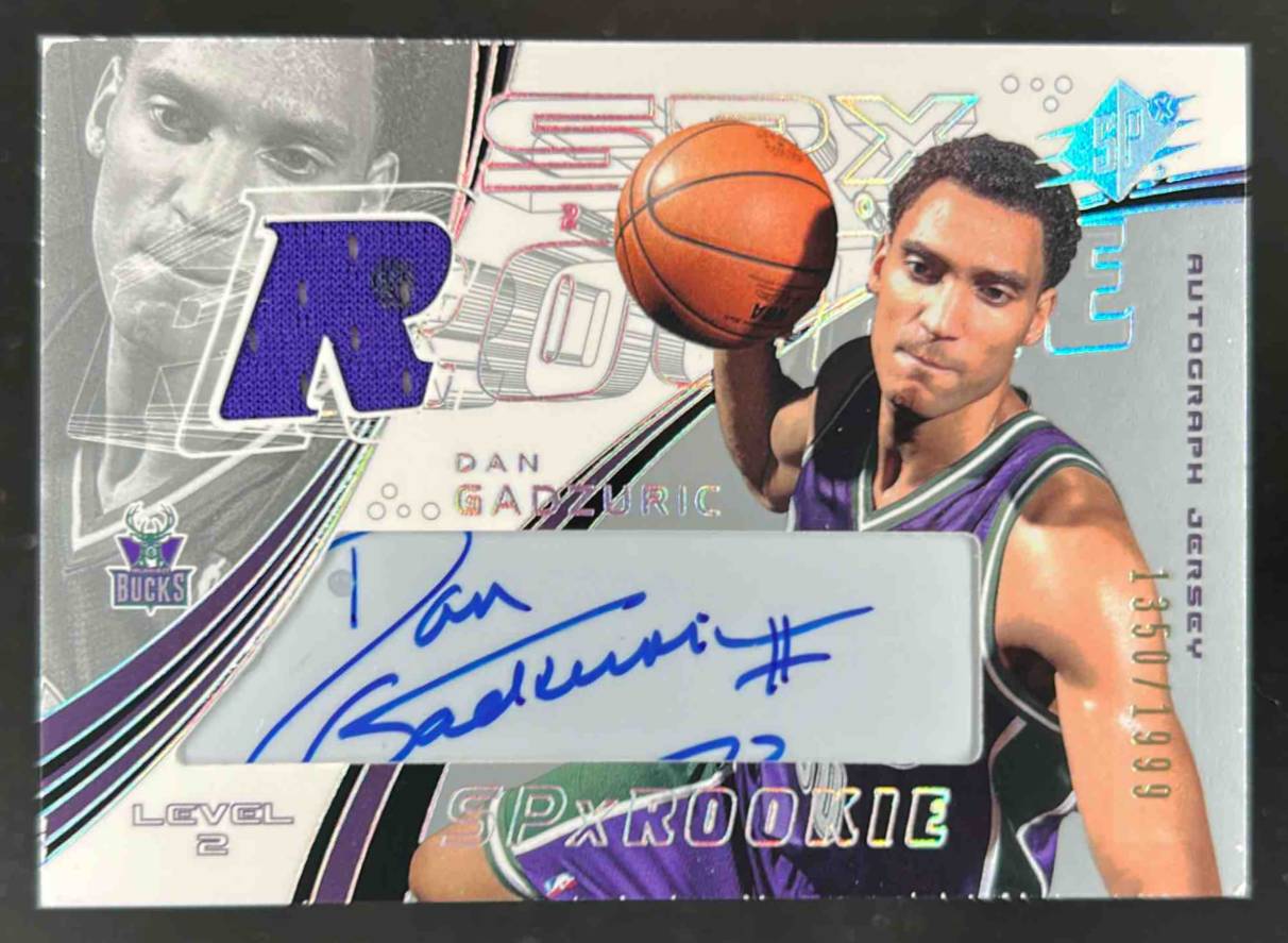 Card image for 2002-03 SPX DAN GADZURIC /1999 #124 MEM AUTO RC ROOKIE MILWAUKEE BUCKS