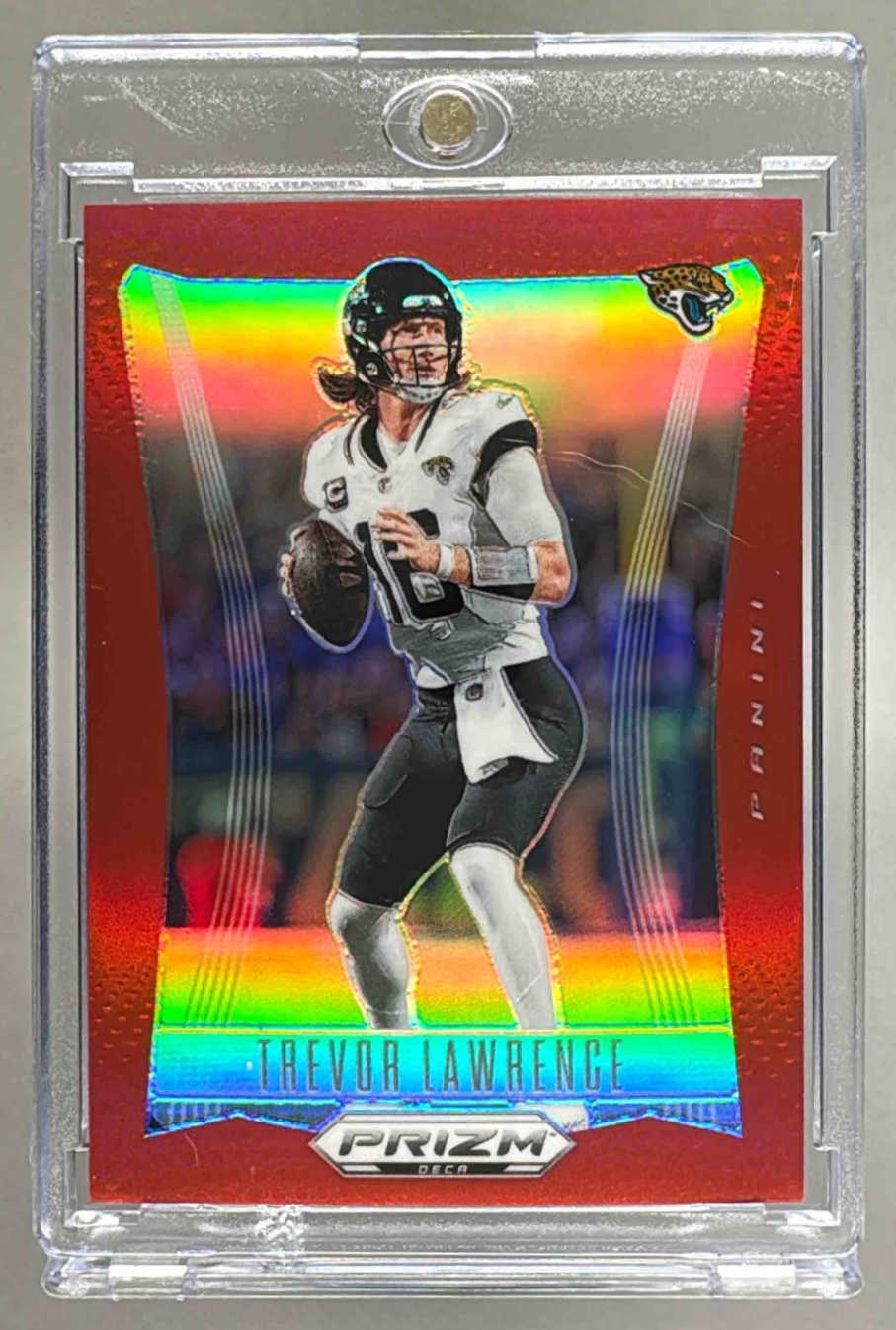 Card image for 2024 Panini Prizm Deca Trevor Lawrence Red /199 #142 Jaguars