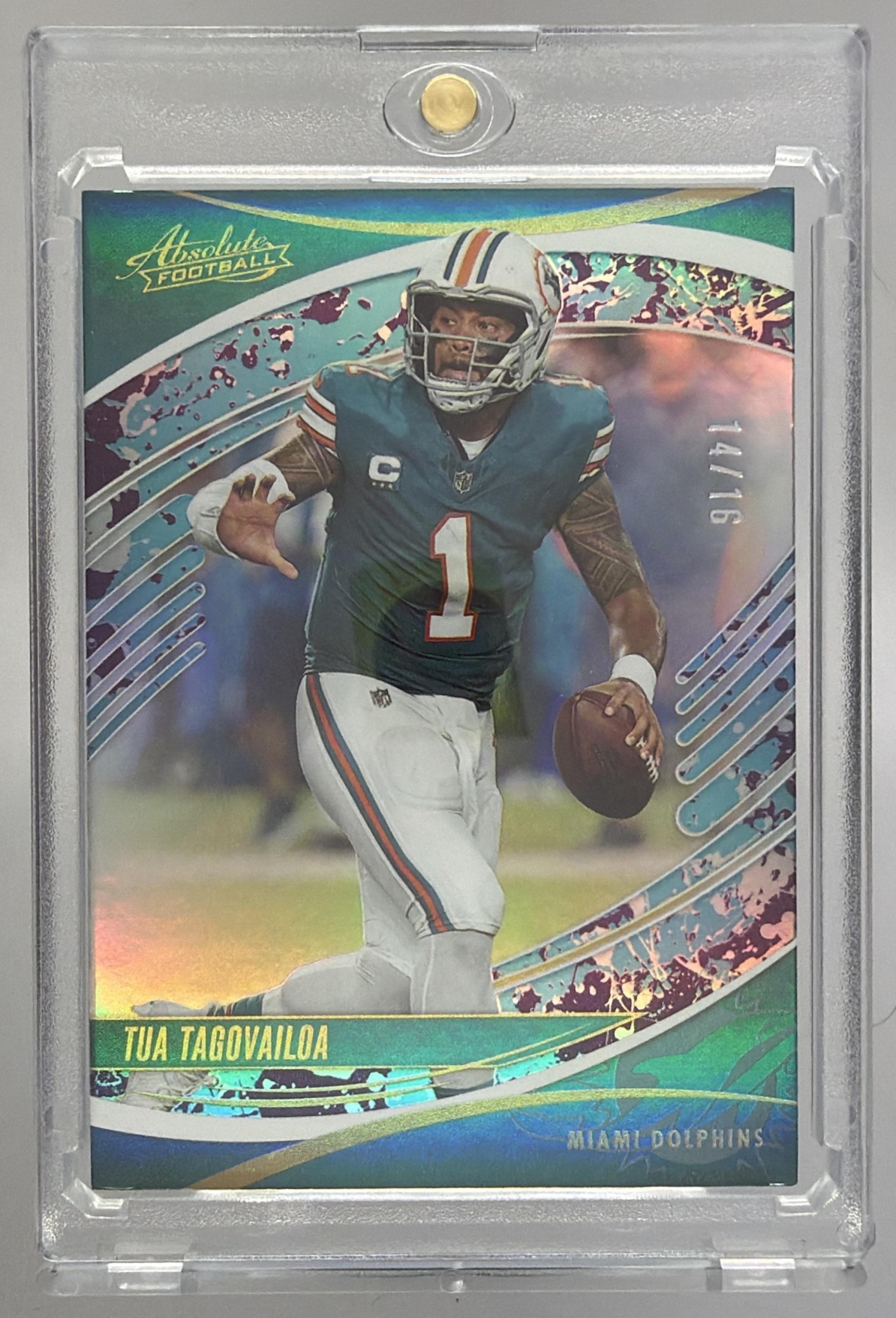 Card image for 2025 Panini Absolute Tua Tagovailoa Spectrum Splash /16 #41 Dolphins